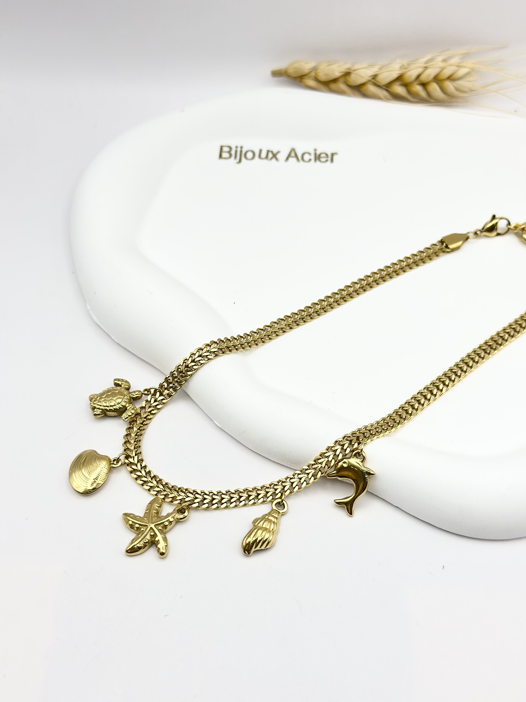 Grossiste Ceramik - Collier "Trésor d’Océan"  Charms Dorés en Acier Inoxydable