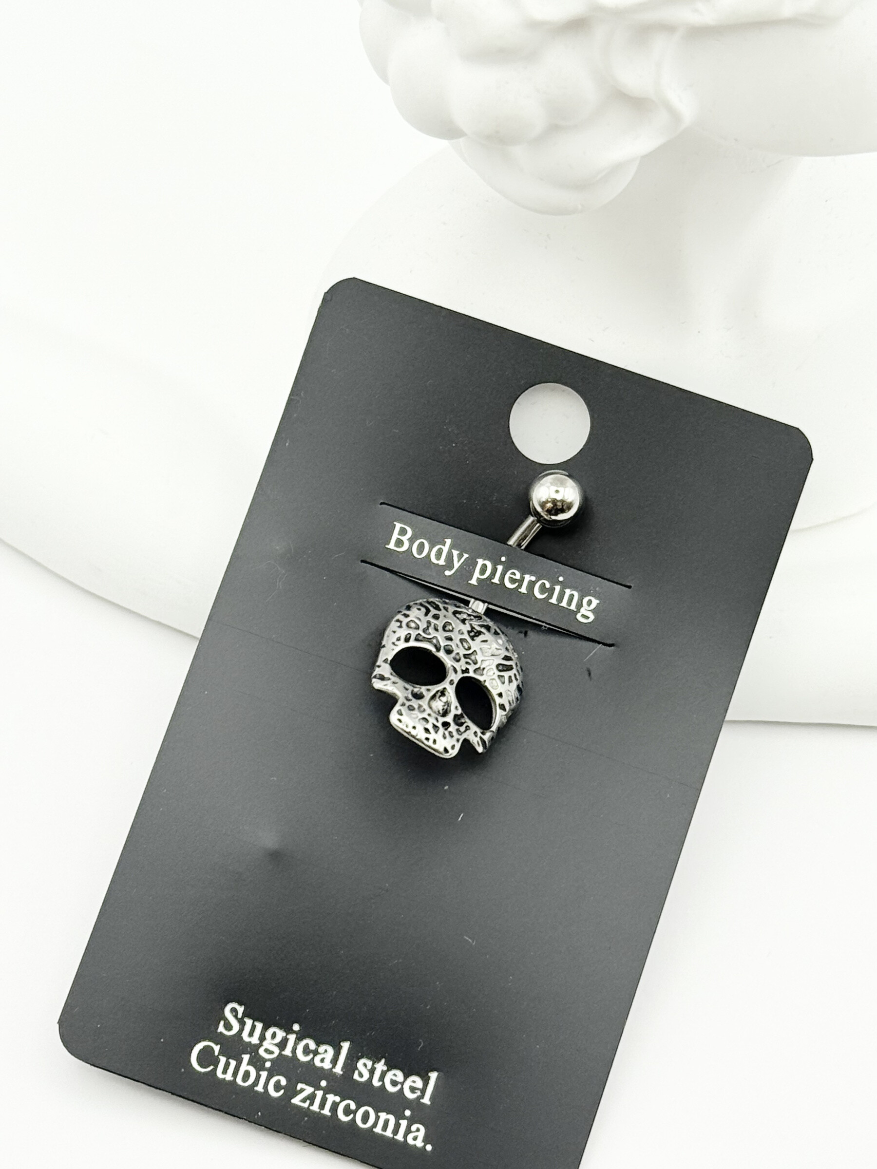 Wholesaler Ceramik - Stainless steel belly button piercing - Hollowed skull