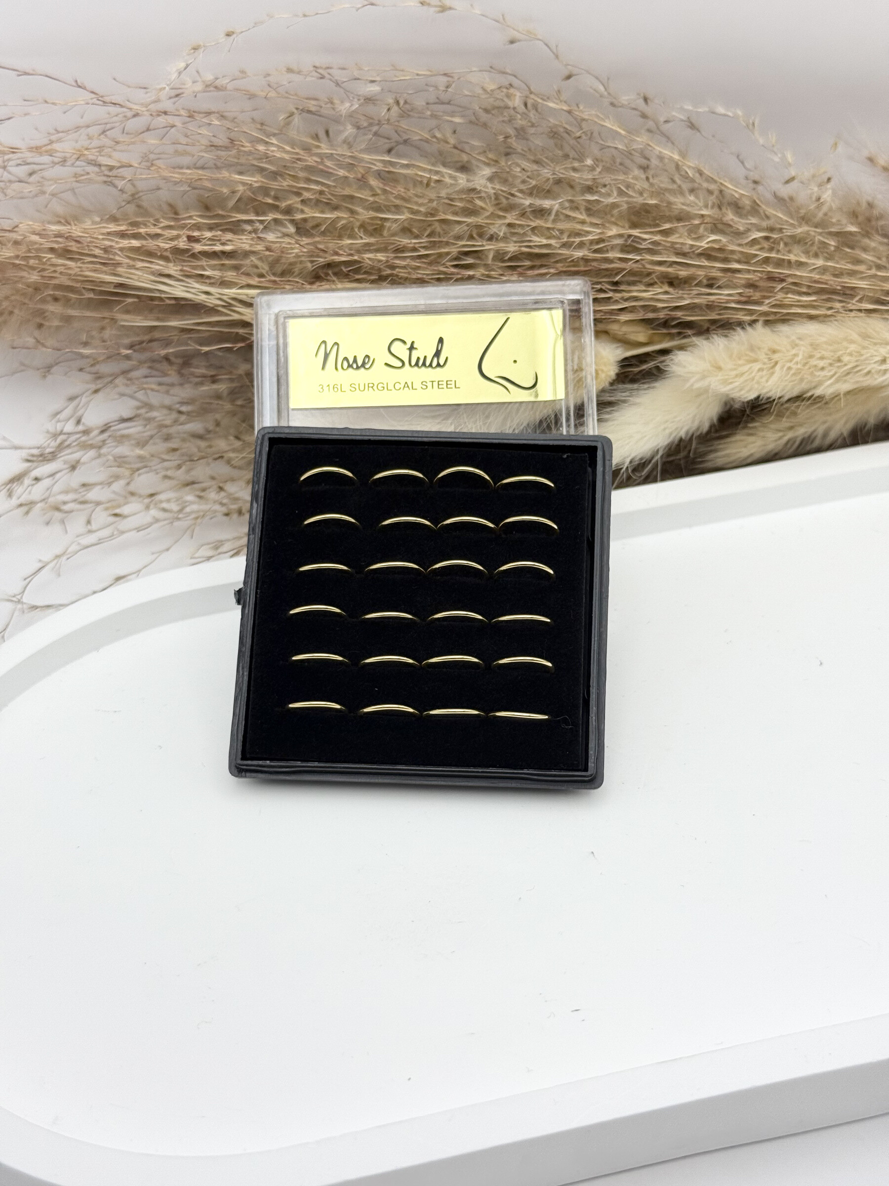 Großhändler Ceramik - Schachtel 40 Nasenpiercings Edelstahl -Strassstangen, 9mm Stange