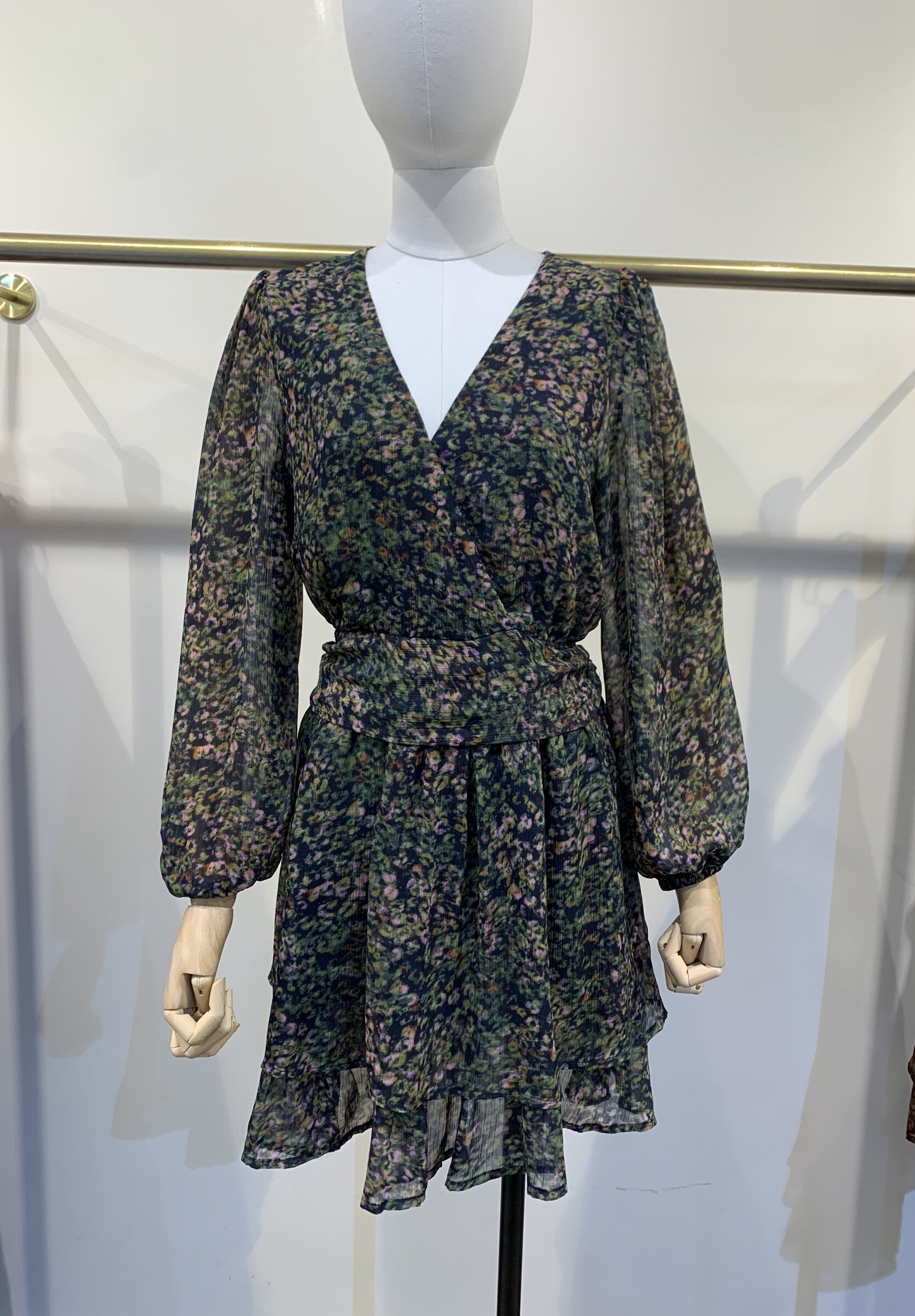 Light printed dress, 100% polyester with cotton lining, perfect for spring/summer. Made in China, unique side closure.