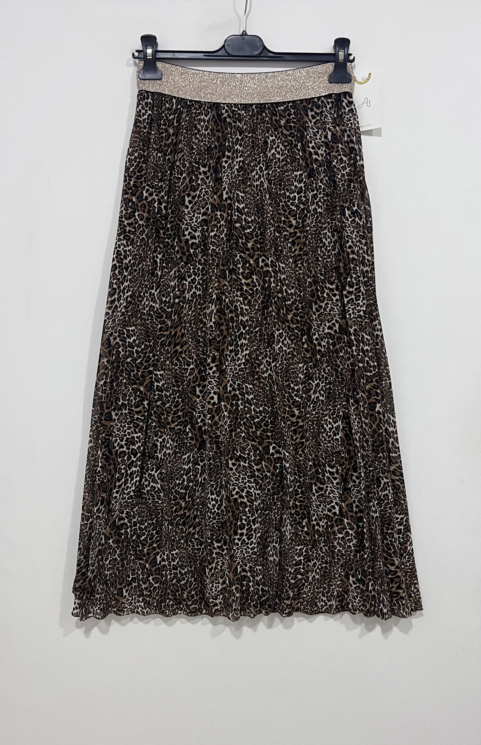 Longueur 90cm, Largeur 34-52cm. Jupe plissée léopard en polyester, fabriquée en Italie pour l'automne/hiver 2025.
