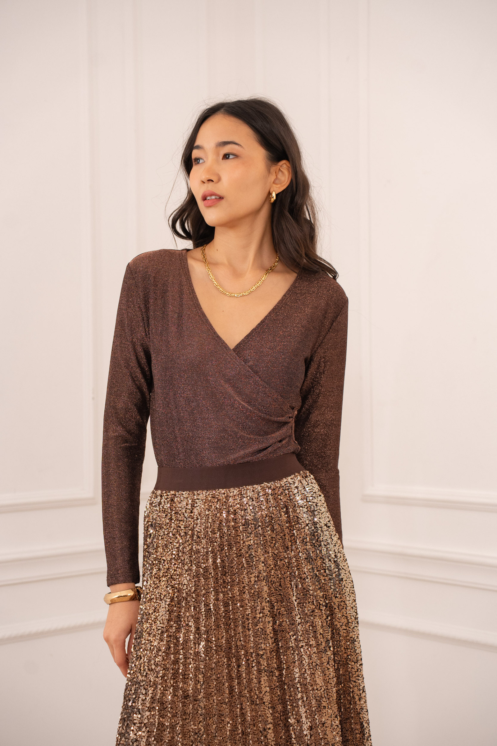 Mayorista Choklate - Top cruzado brillante de lurex