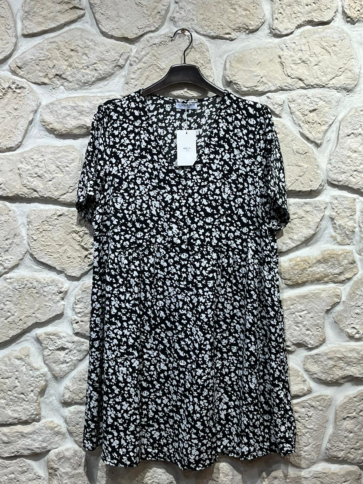 Light tunic dress, 100% polyester, ideal for summer 2025, made in China, with a charming floral pattern.