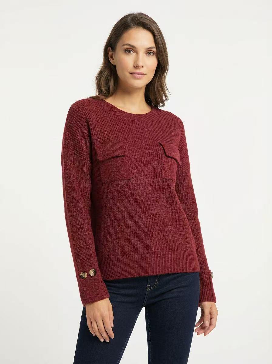 Sweater with button on the sleeve