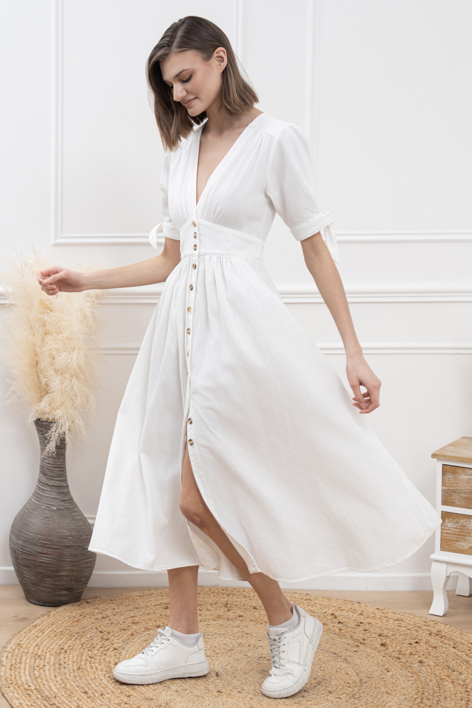 -Levered long -cotton -cotton -Boutonnage on the front -M -Longes with adjustable knots -curved tail