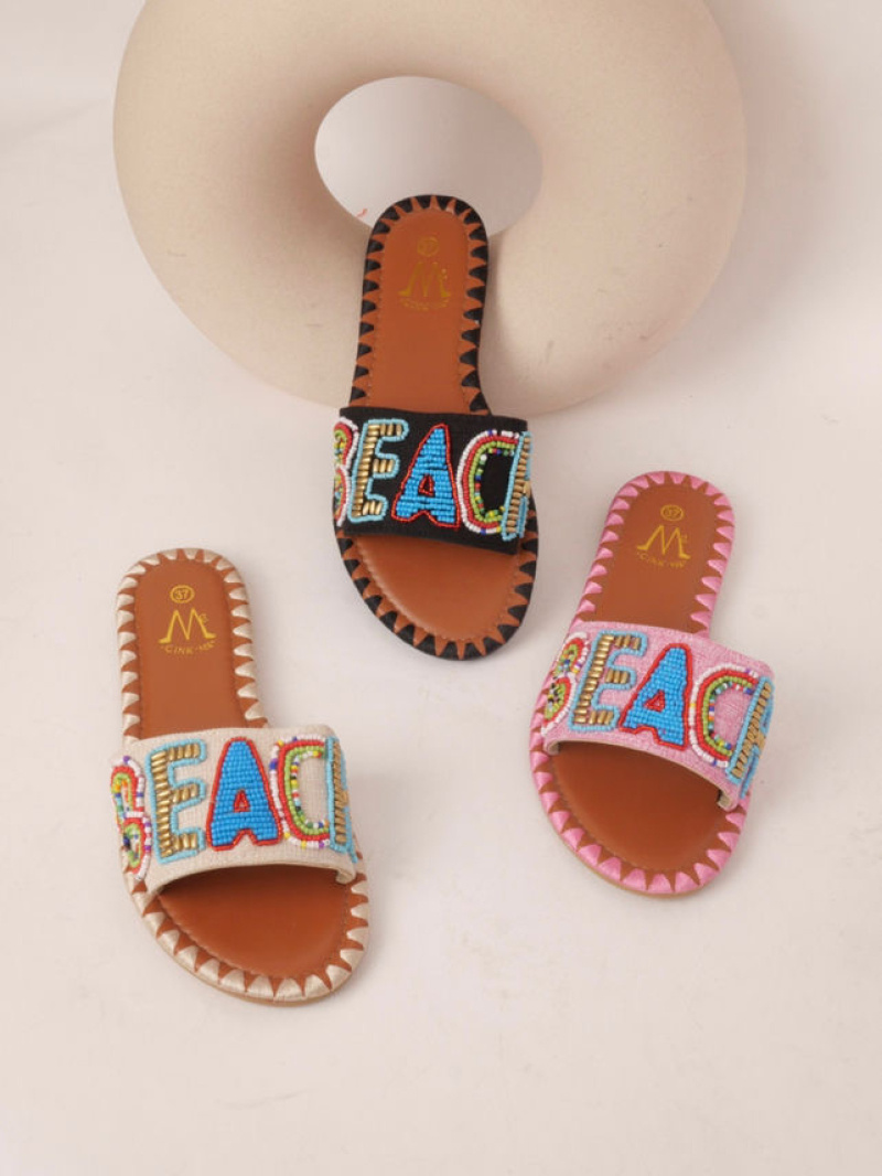 Grossiste Cink Me - Mules à large bride avec lettres "BEACH" en perles multicolores