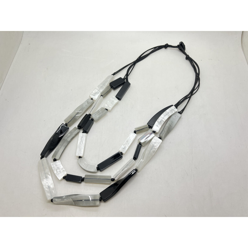 Wholesaler CLEDOR - Multi -ranks necklace made up of polyester wires and tile pearls.