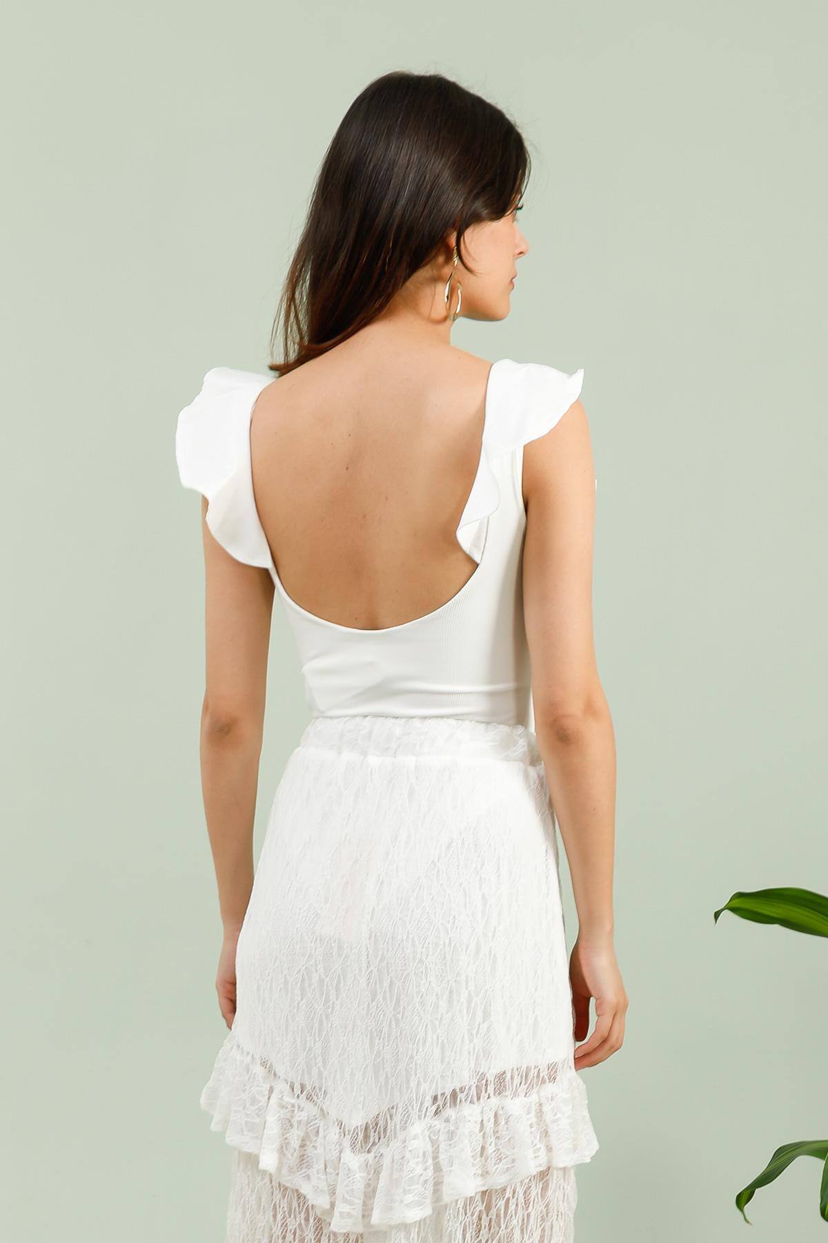 Grossista Copperose - Body in maglia a coste con scollo a balze