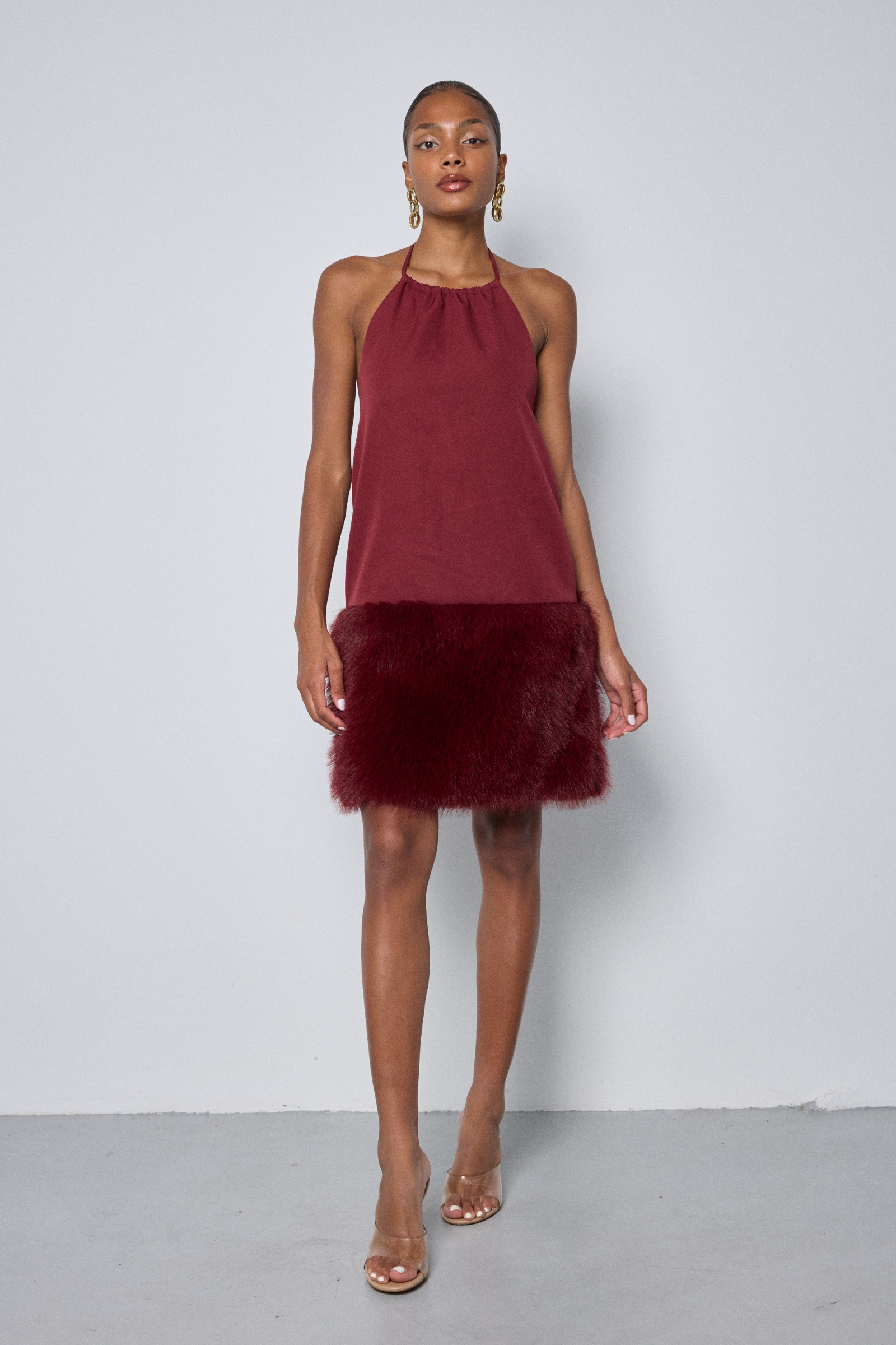 Mayorista Copperose - VESTIDO CORTO CON ESCOTE HALTER Y BAJO DE PIEL SINTÉTICA