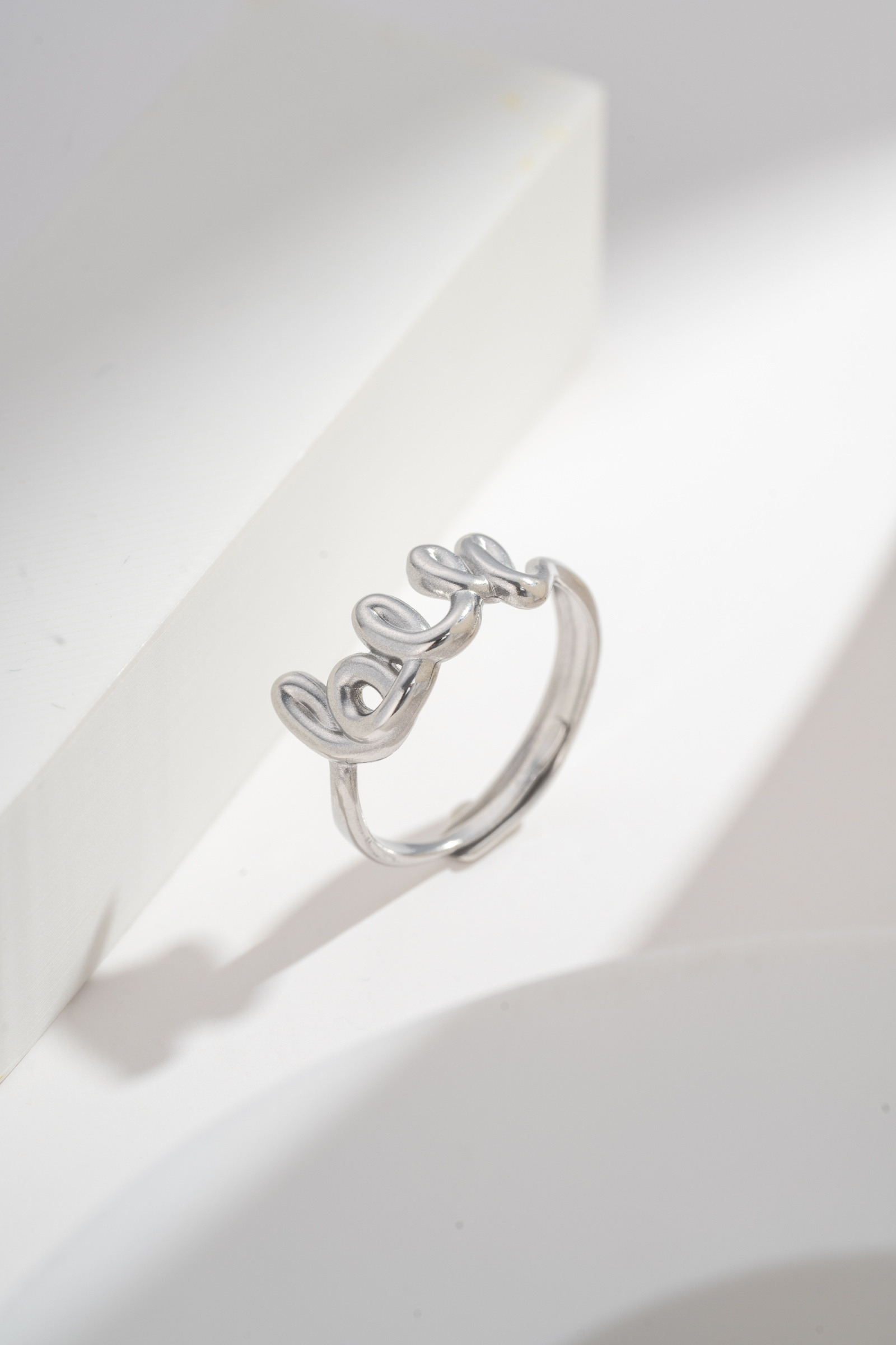 Großhändler COSMOS - Verstellbarer Skulptierter “LOVE” Ring aus Edelstahl