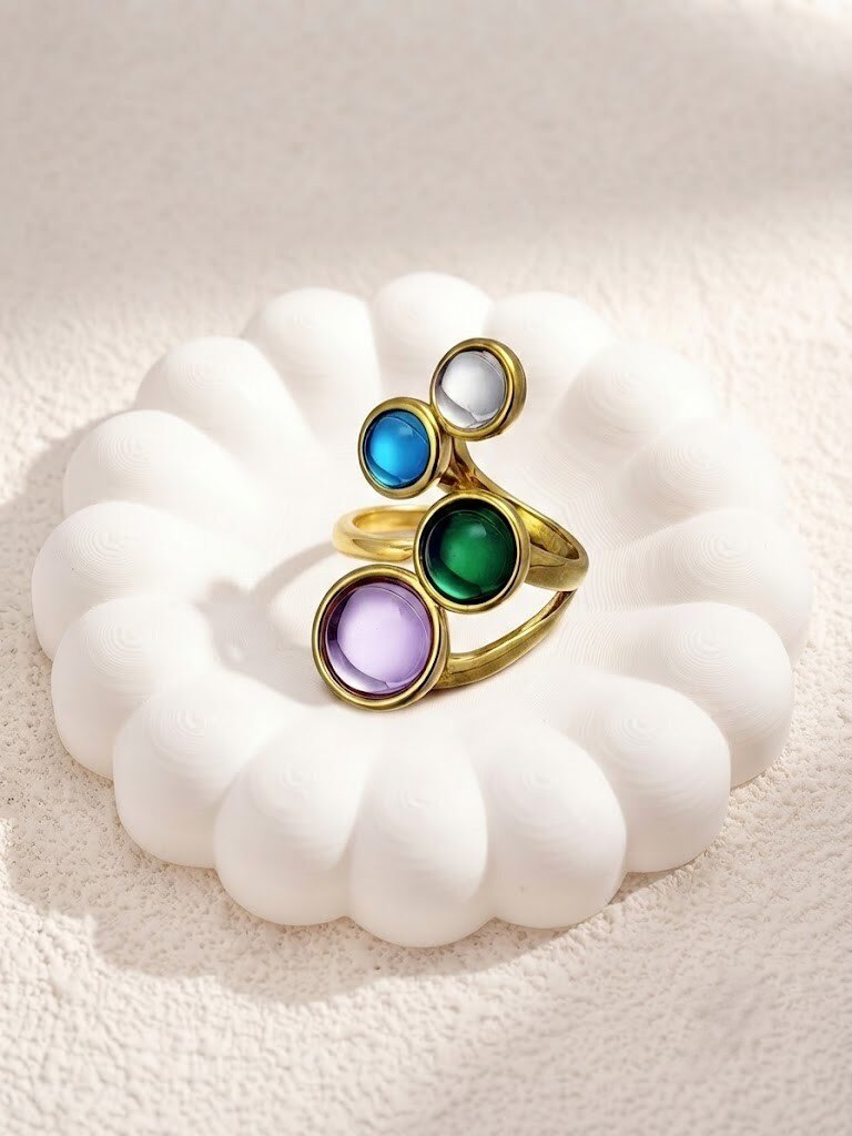 Grossista COSMOS - Anello elegante moderno regolabile chic con pietre colorate occhio di gatto in acciaio inossidabile dorato