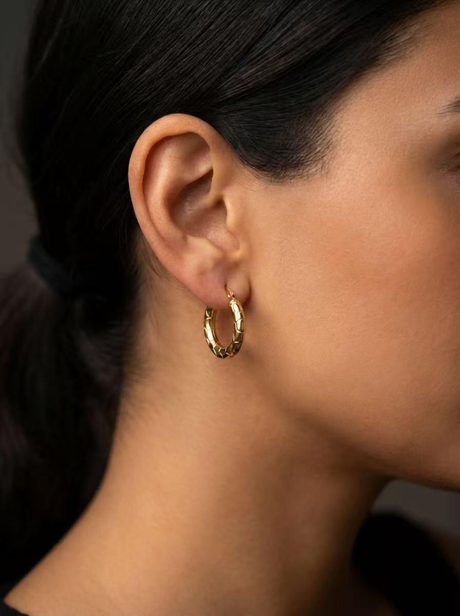 Wholesaler COSMOS - Elegant modern textured gold stainless steel hoops, bright, timeless, and chic