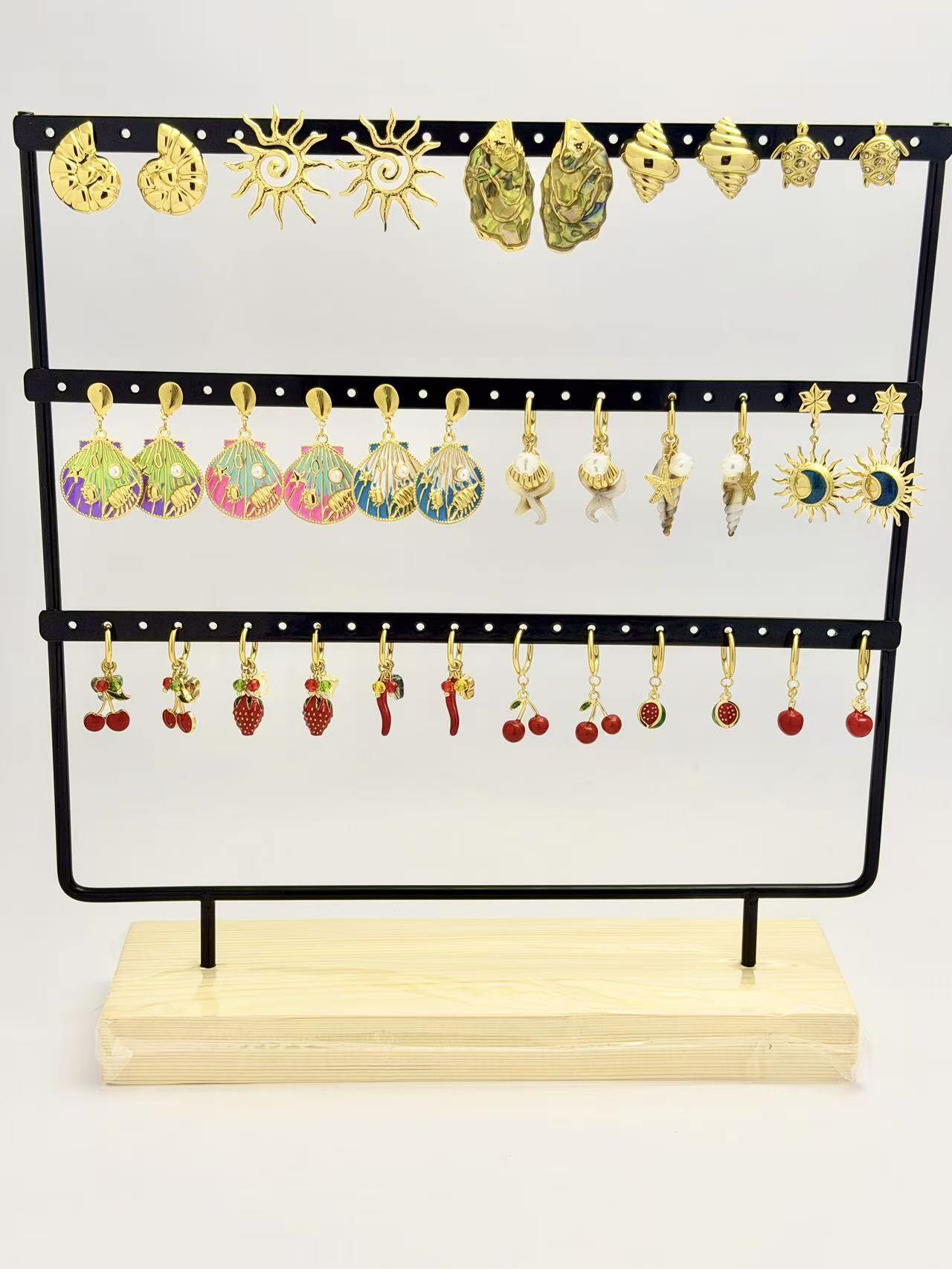 Mayorista COSMOS - Juego de 14 pares de pendientes de acero inoxidable con motivos de frutas, sol y mar