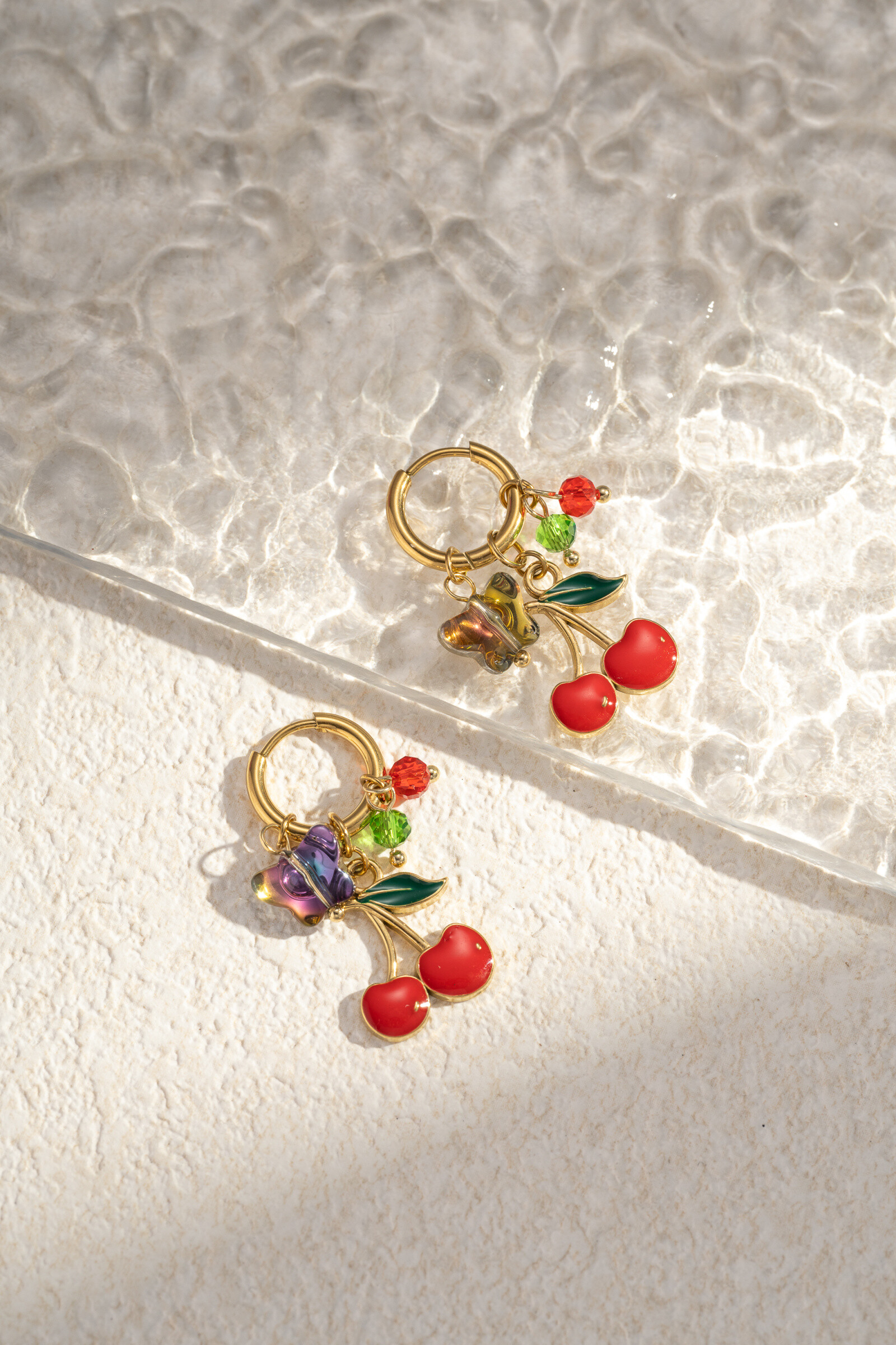 Grossiste COSMOS - Boucle d’oreille créole pendante acier inoxydable cerise perle colorée