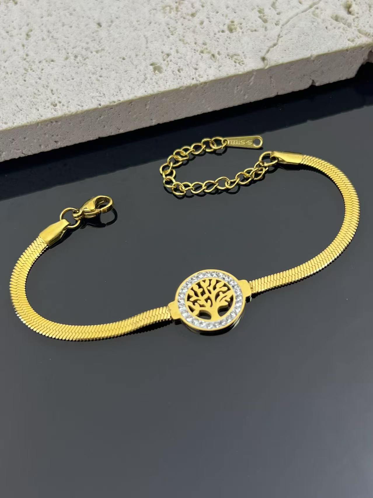 Grossista COSMOS - Bracciale in acciaio inossidabile con albero della vita ornato di strass