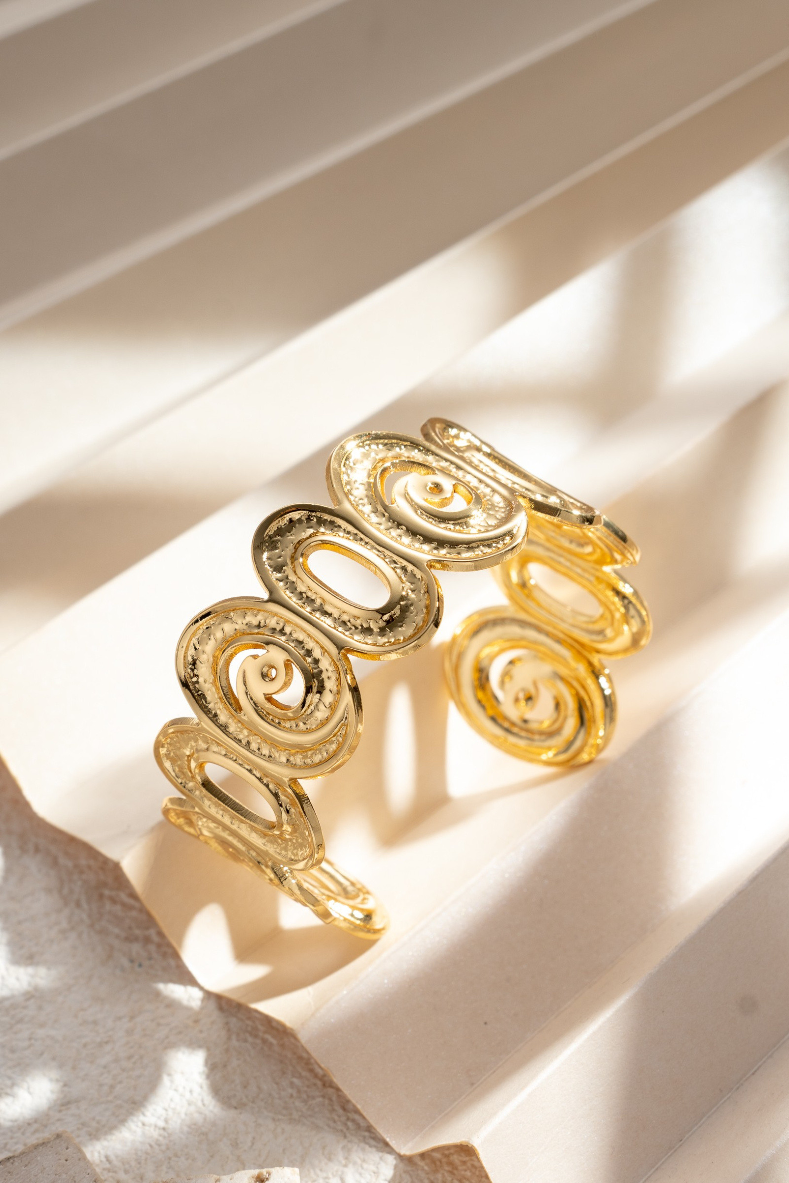 Wholesaler COSMOS - Golden spiral textured sculptural modern bracelet for women, chic, elegant, bright, trendy
