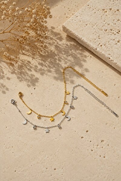 Wholesaler COSMOS - Set of 2 stainless steel bracelets in gold and silver with star and lucky clover designs Wholesaler COSMOS - Set of 2 stainless steel bracelets in gold and silver with star and lucky clover designs