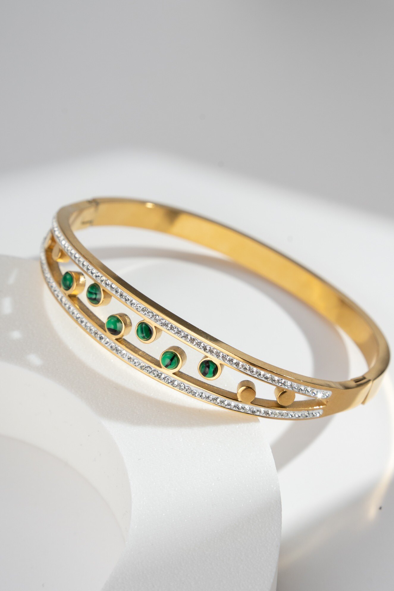 Wholesaler COSMOS - Elegant bangle bracelet adorned with stones and crystals in refined stainless steel
