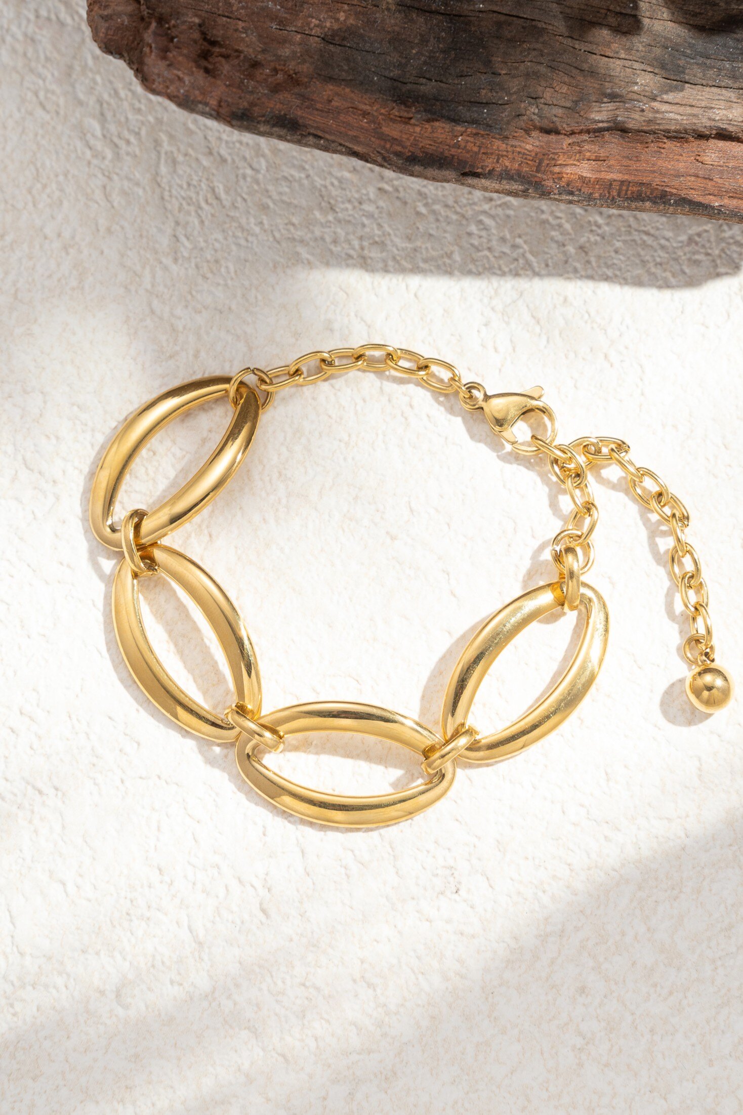 Mayorista COSMOS - Pulsera de acero inoxidable dorado para mujer con eslabones ovalados anchos, cadena ajustable elegante