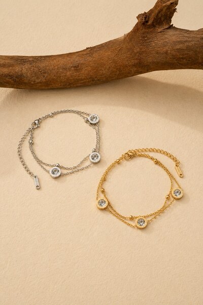 Wholesaler COSMOS - Set of 2 stainless steel bracelets in gold and silver with round stones, modern and delicate shine Wholesaler COSMOS - Set of 2 stainless steel bracelets in gold and silver with round stones, modern and delicate shine
