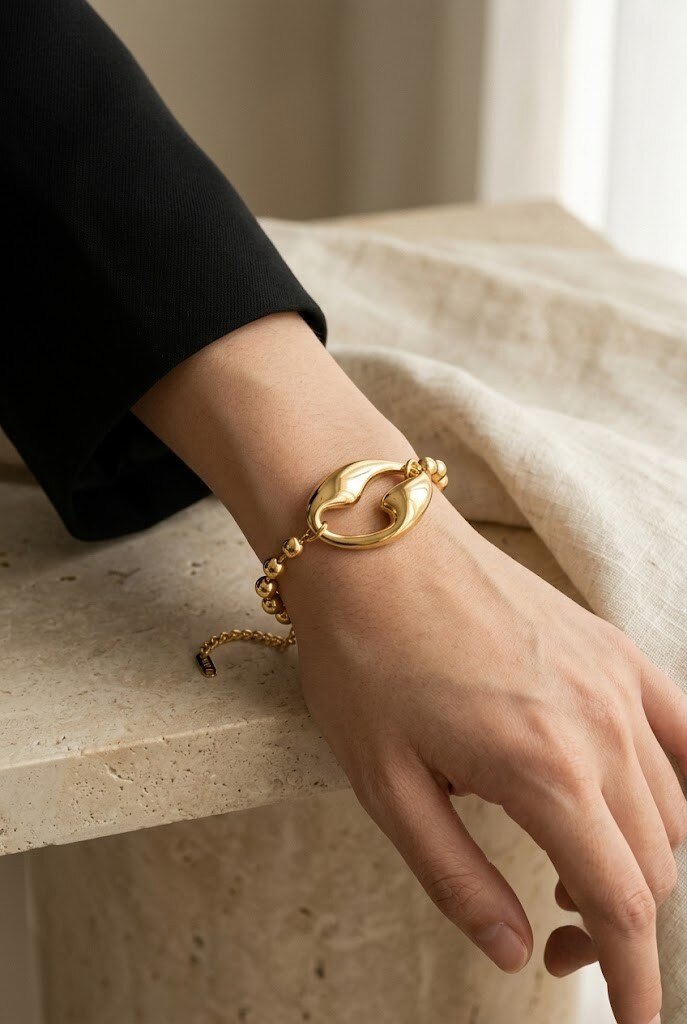 Grossiste COSMOS - Bracelet doré boules acier inoxydable maillons sculpturaux moderne femme tendance