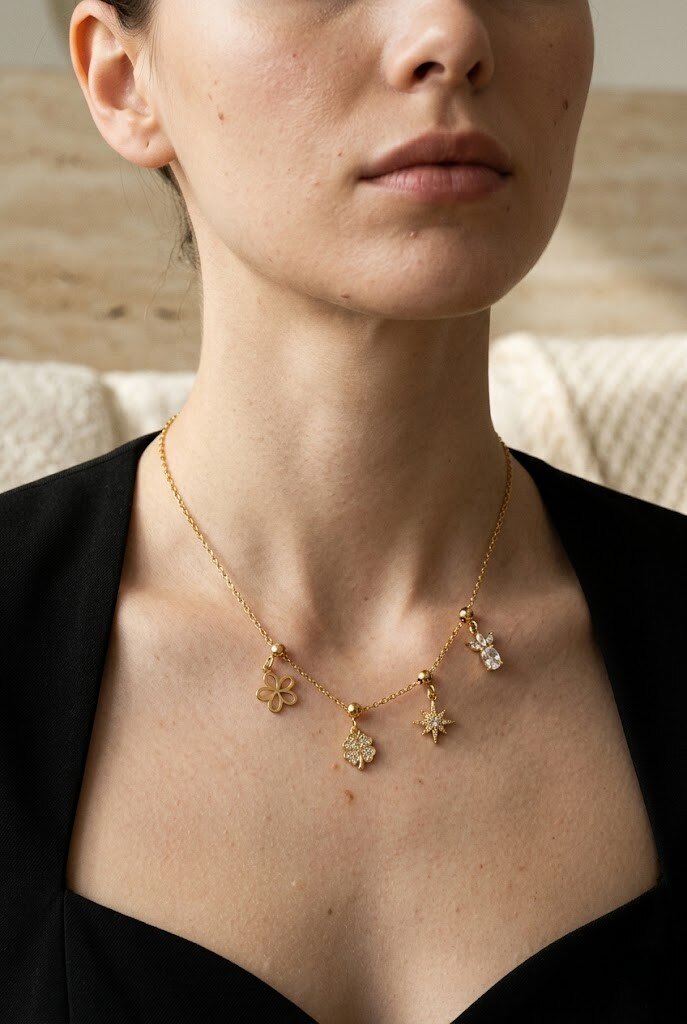 Wholesaler COSMOS - Golden necklace with symbolic charms in delicate, feminine, elegant, chic stainless steel