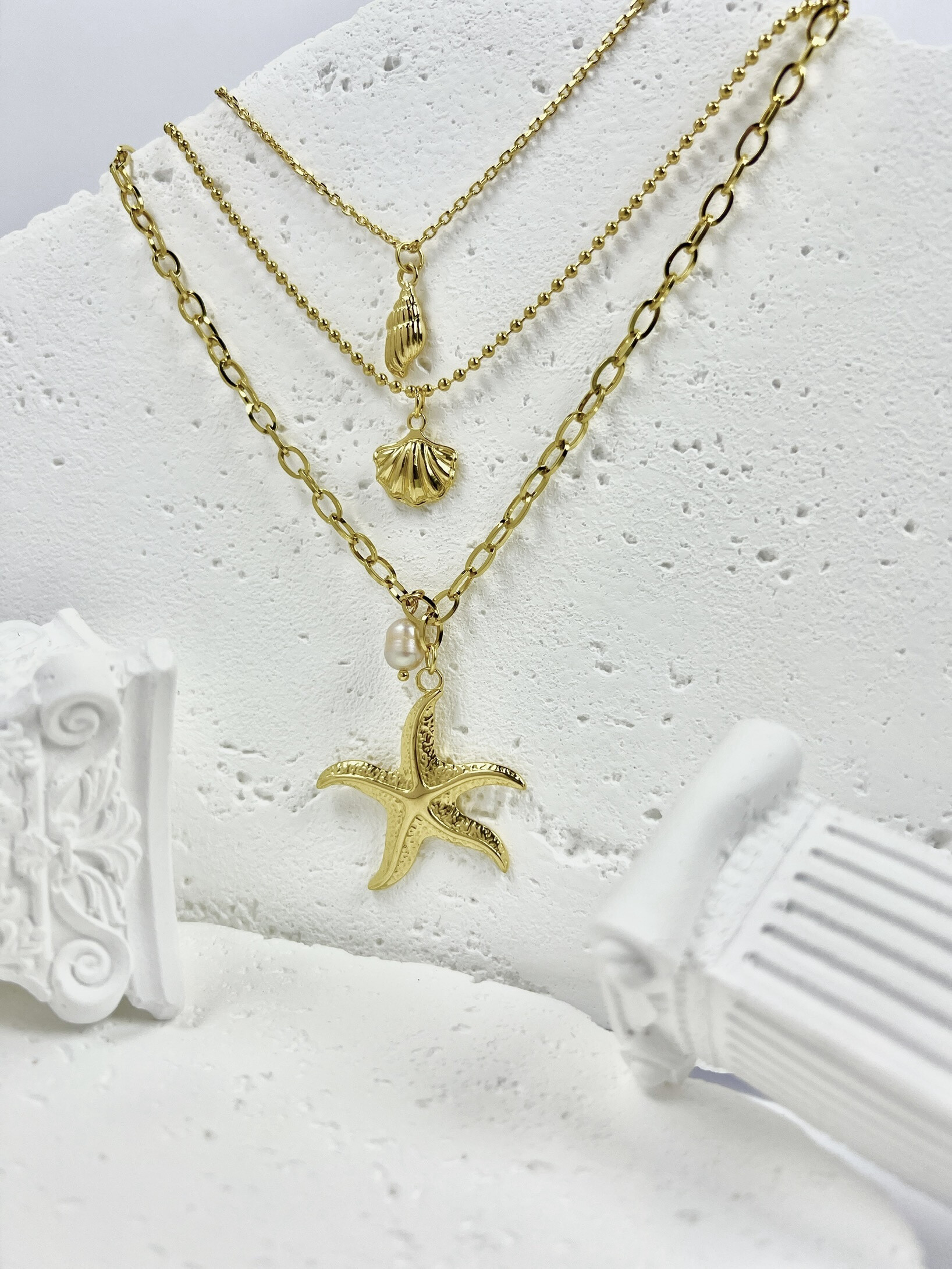 Grossiste COSMOS - Collier triple doré pendentifs coquillages étoile mer en acier inoxydable
