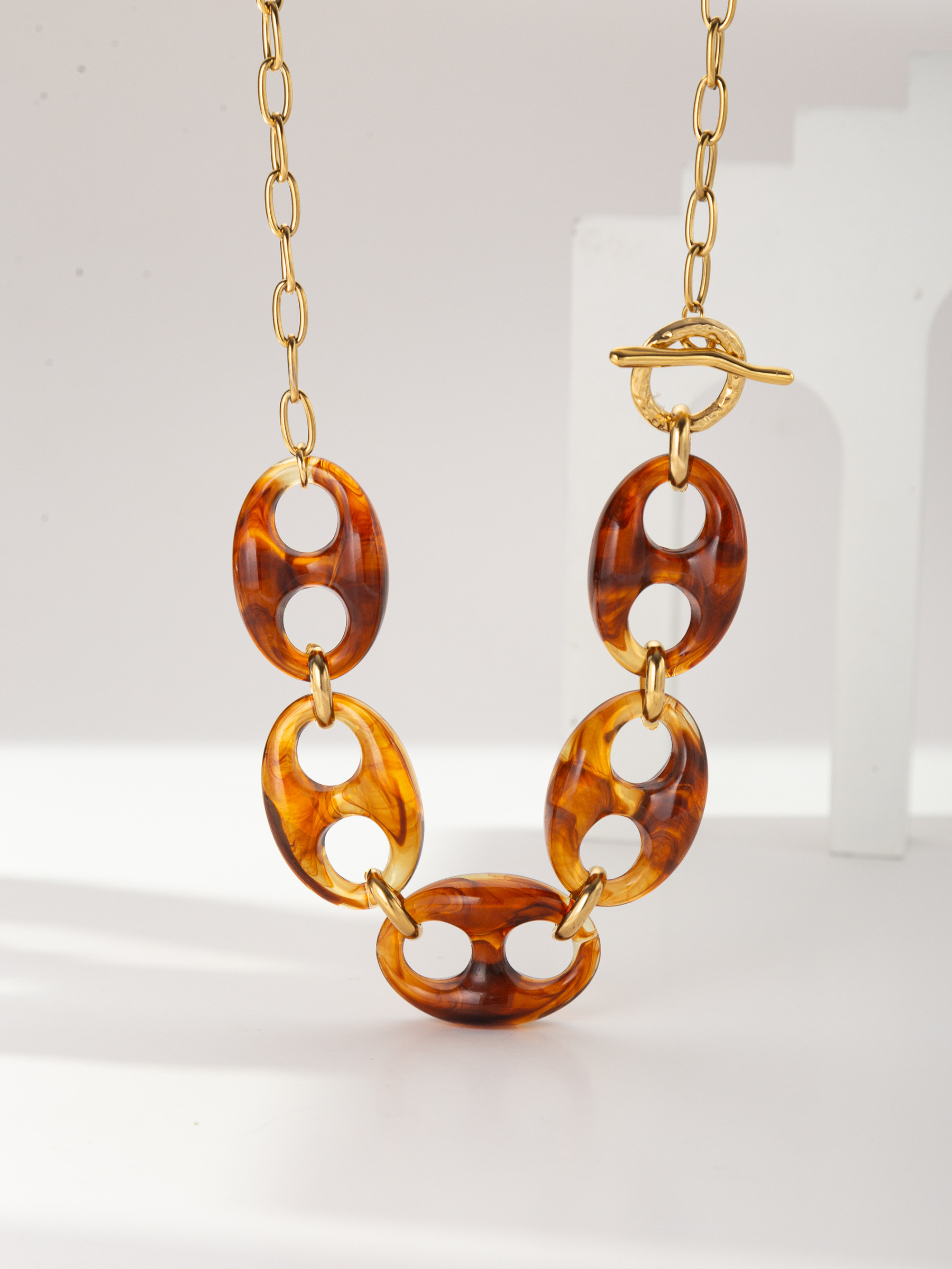 Wholesaler COSMOS - Resin and steel necklace with oval stainless steel design
