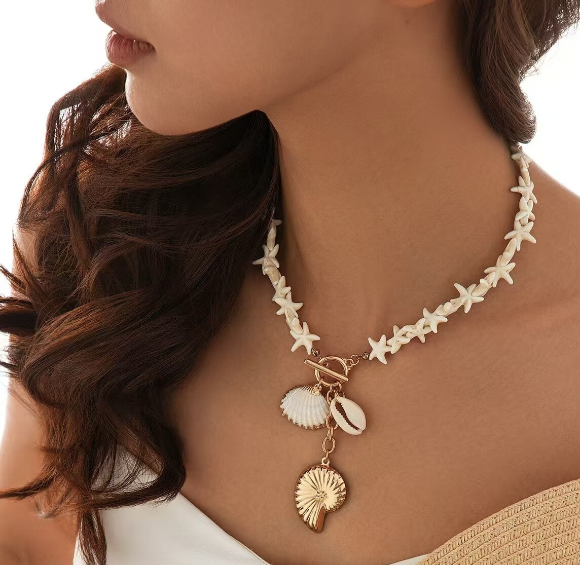 Wholesaler COSMOS - Star necklace & golden pendants