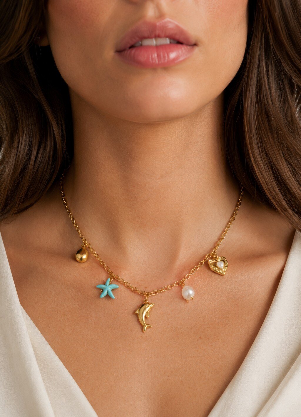 Mayorista COSMOS - Collar dorado con charms marinos estrella turquesa delfín perla corazón acero inoxidable chic