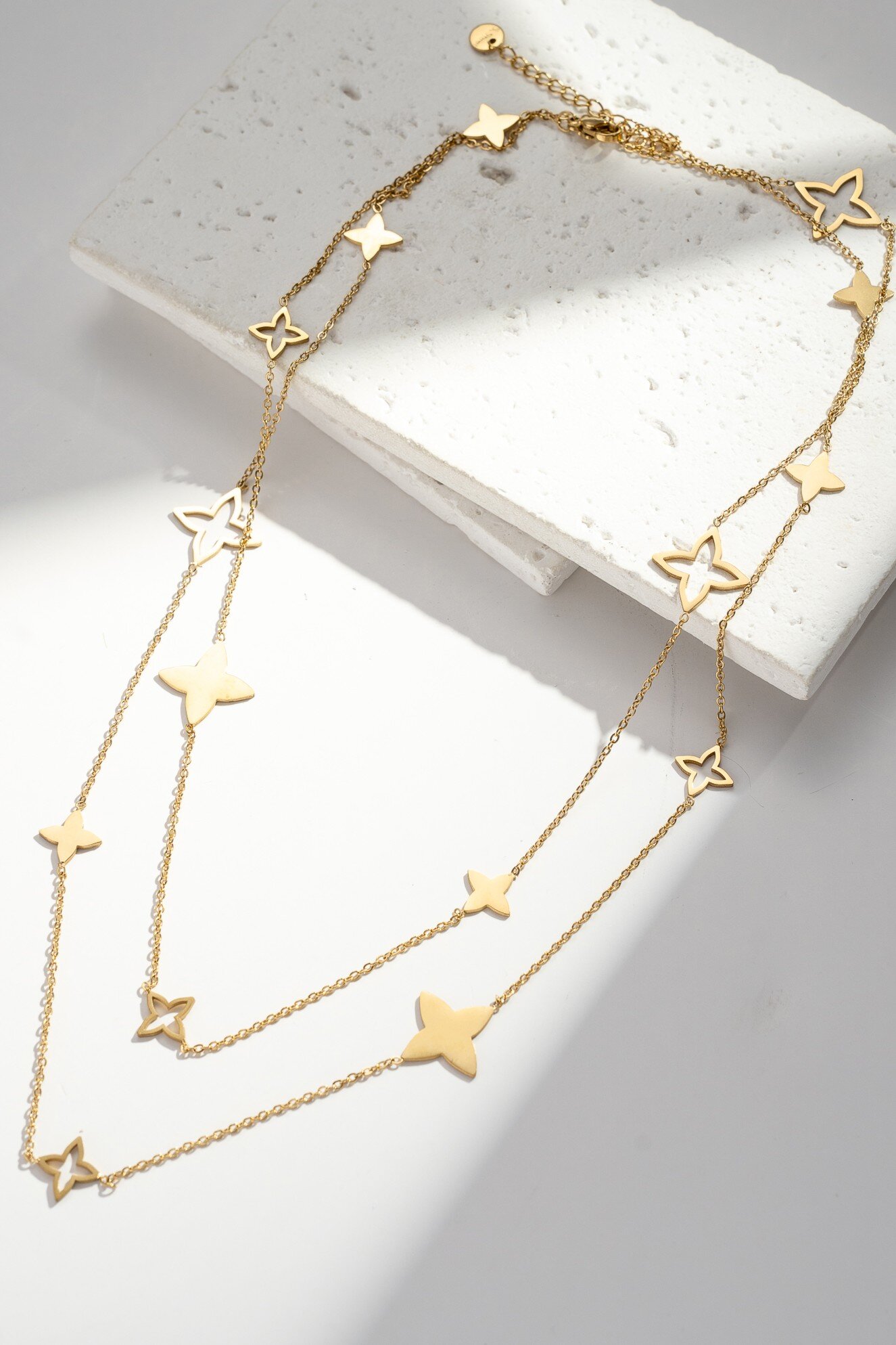 Wholesaler COSMOS - Elegant chic long star pendant necklace in gold stainless steel