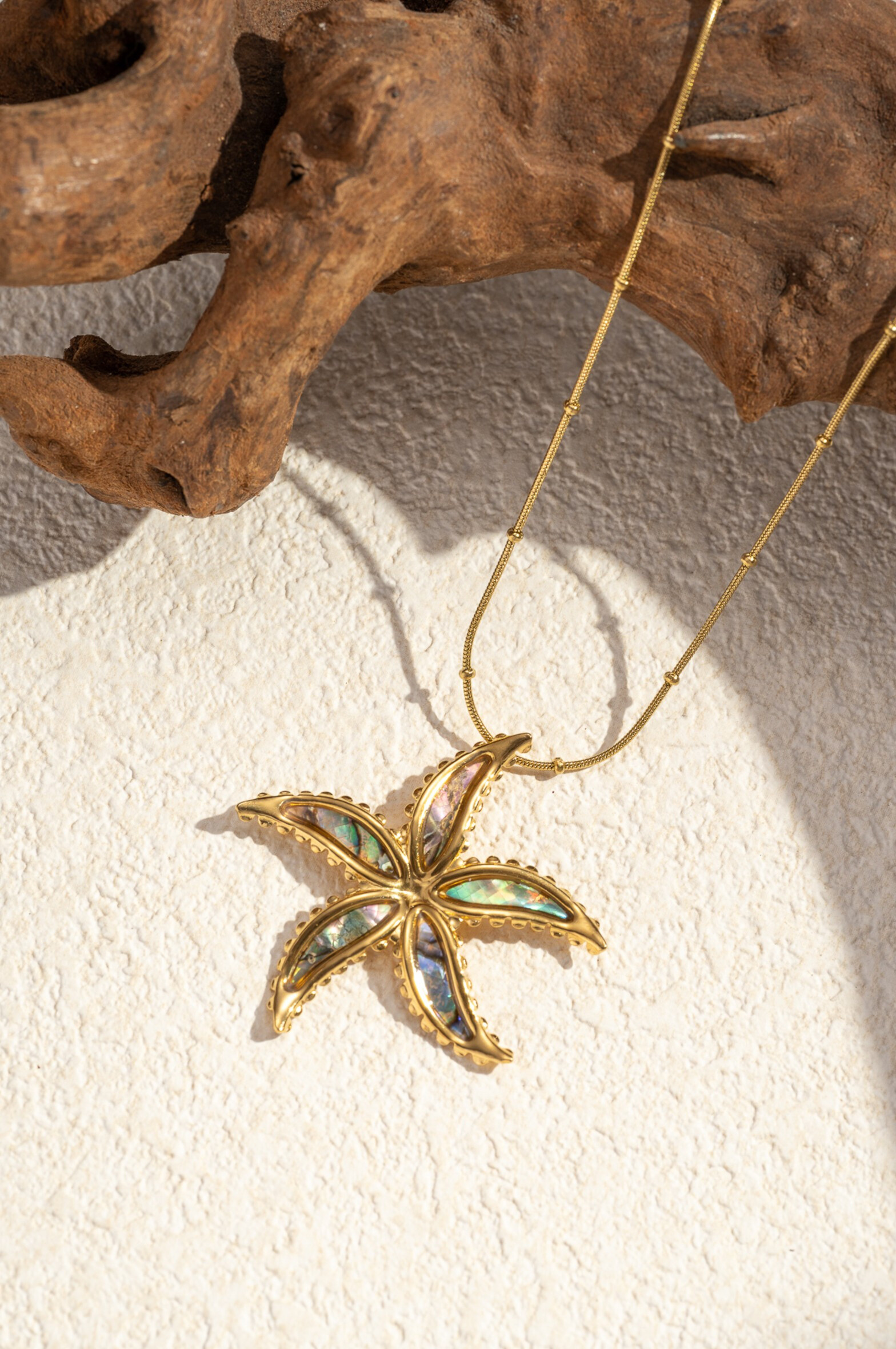 Grossiste COSMOS - Collier Étoile de Mer – Acier Inoxydable & Nacre Irisée