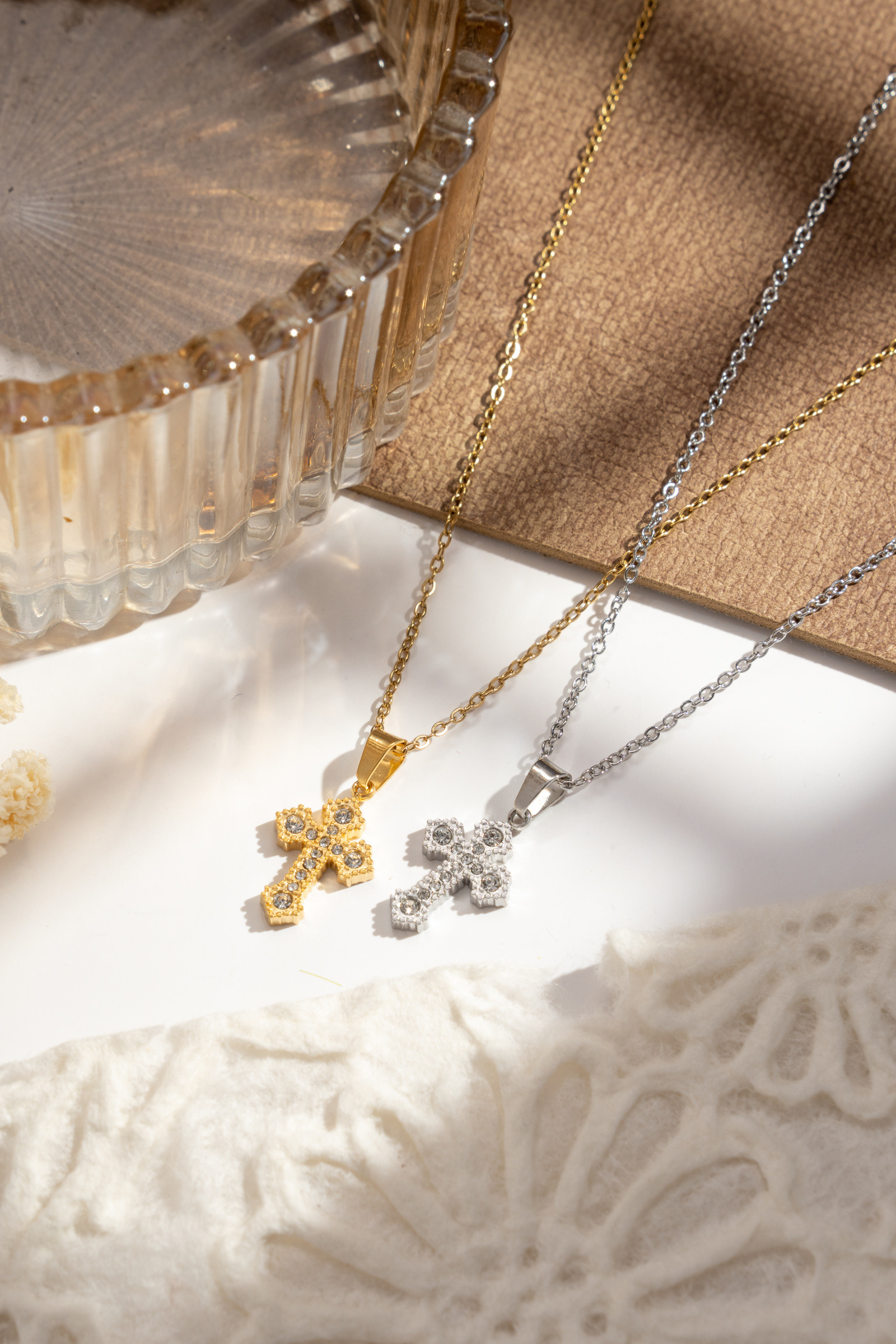 Wholesaler COSMOS - Women's elegant and trendy cross necklace with gold and silver crystals, shiny stainless steel