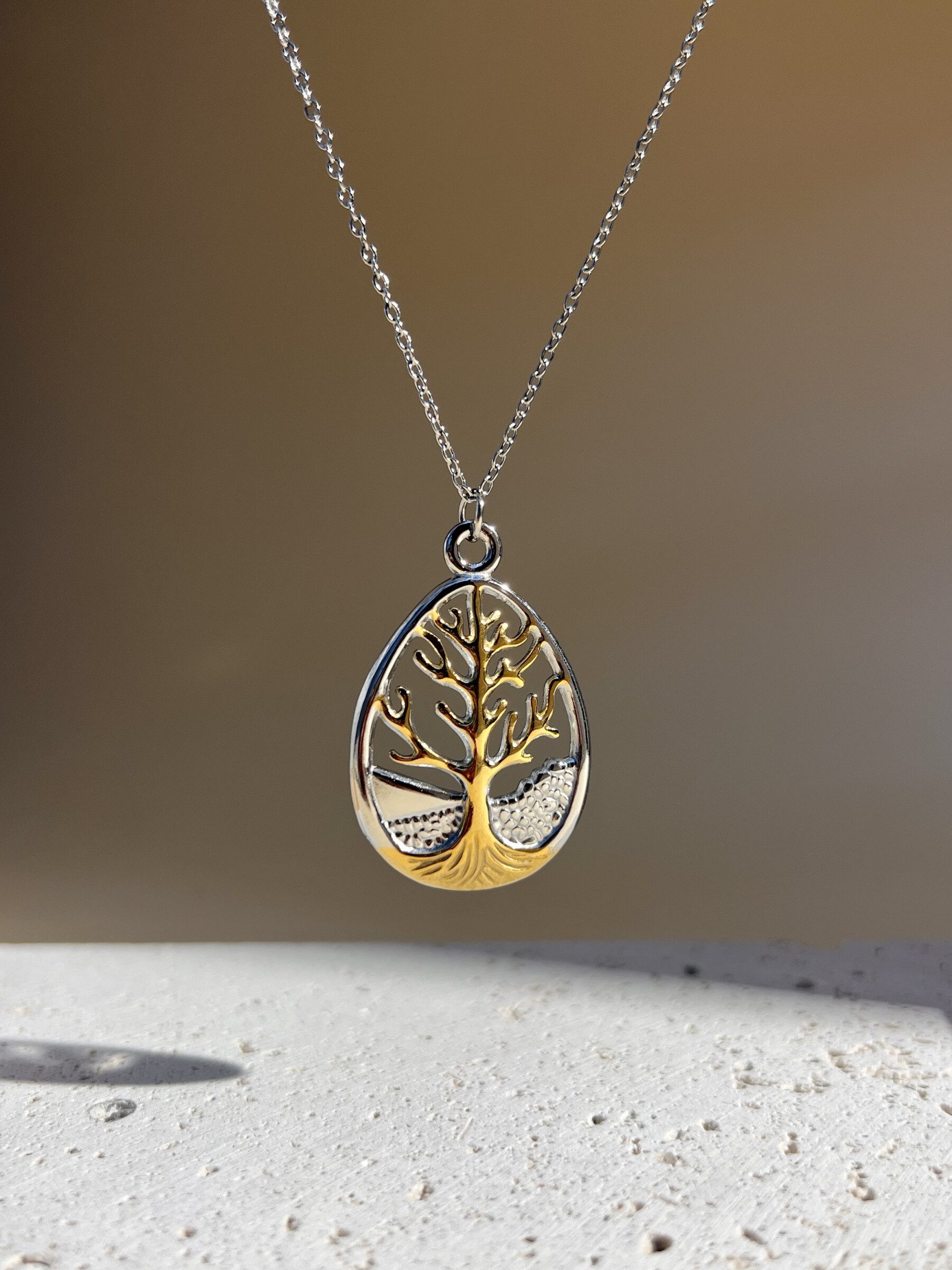 Grossiste COSMOS - Collier arbre de vie – pendentif ovale acier inoxydable bicolore