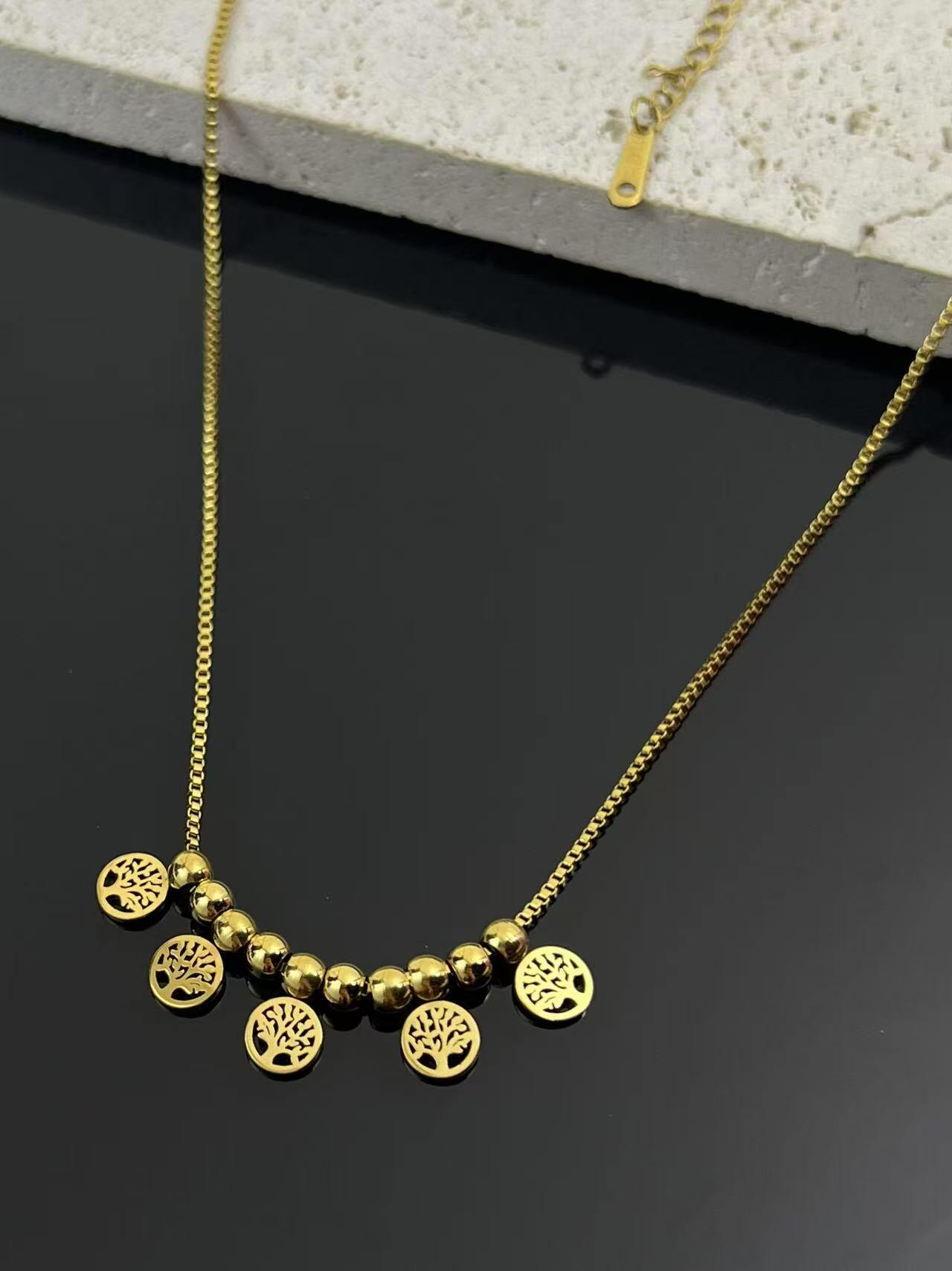 Grossista COSMOS - Collana in acciaio inossidabile con ciondoli Alberi della vita