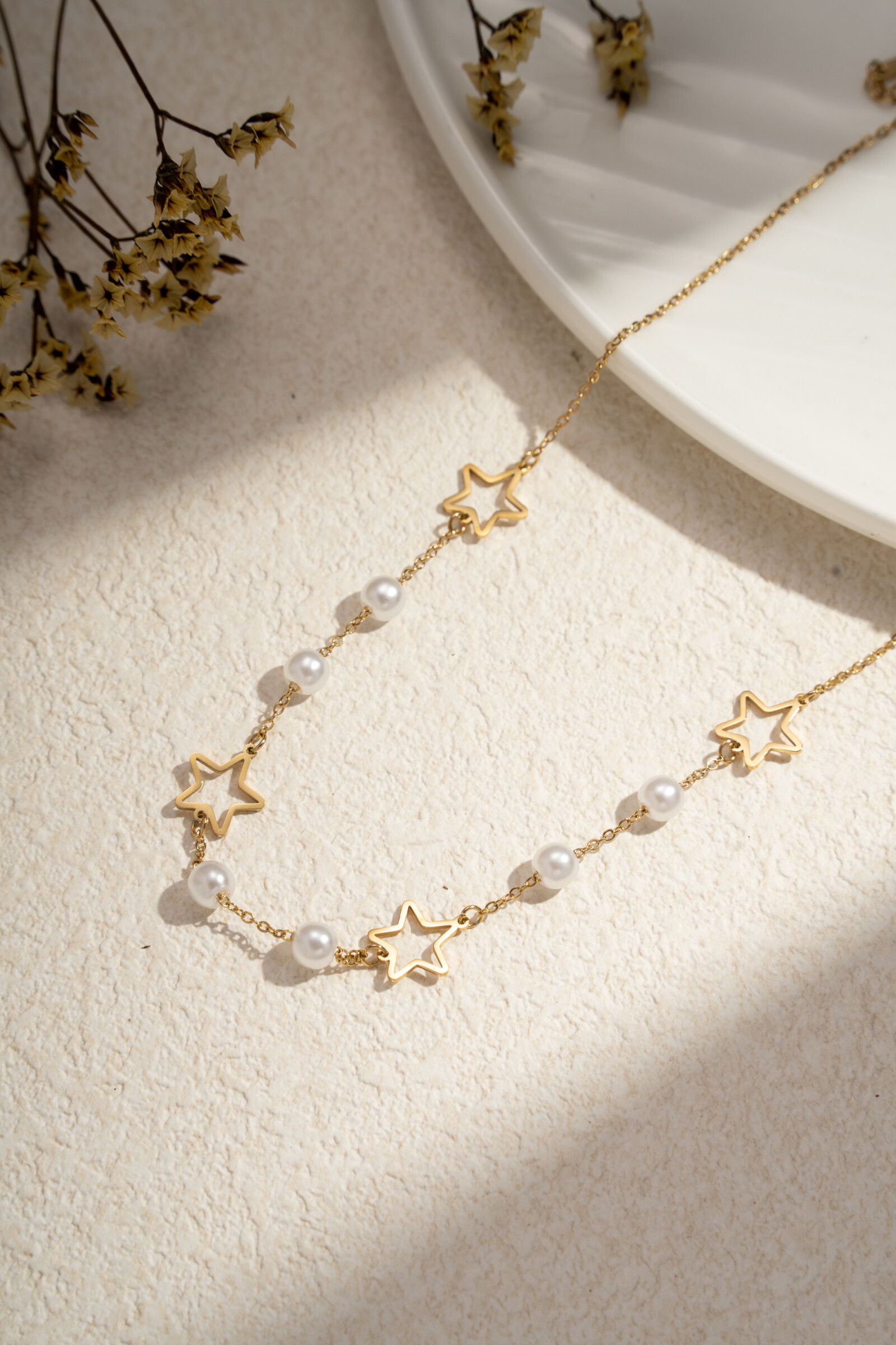 Wholesaler COSMOS - Star necklace & golden pearls