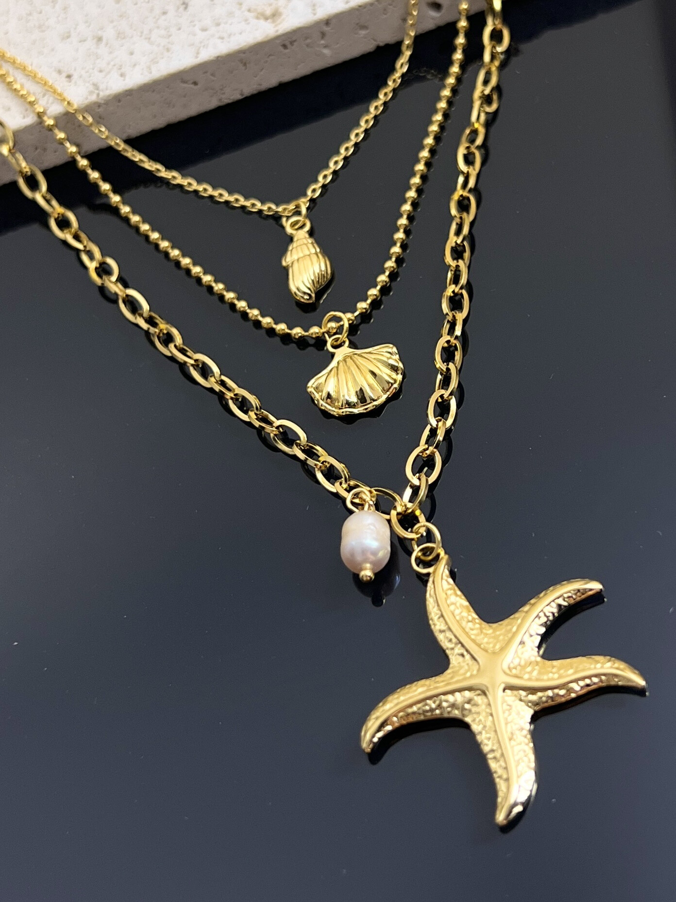 Grossiste COSMOS - Collier Triple Tour – Coquillage & Étoile de Mer