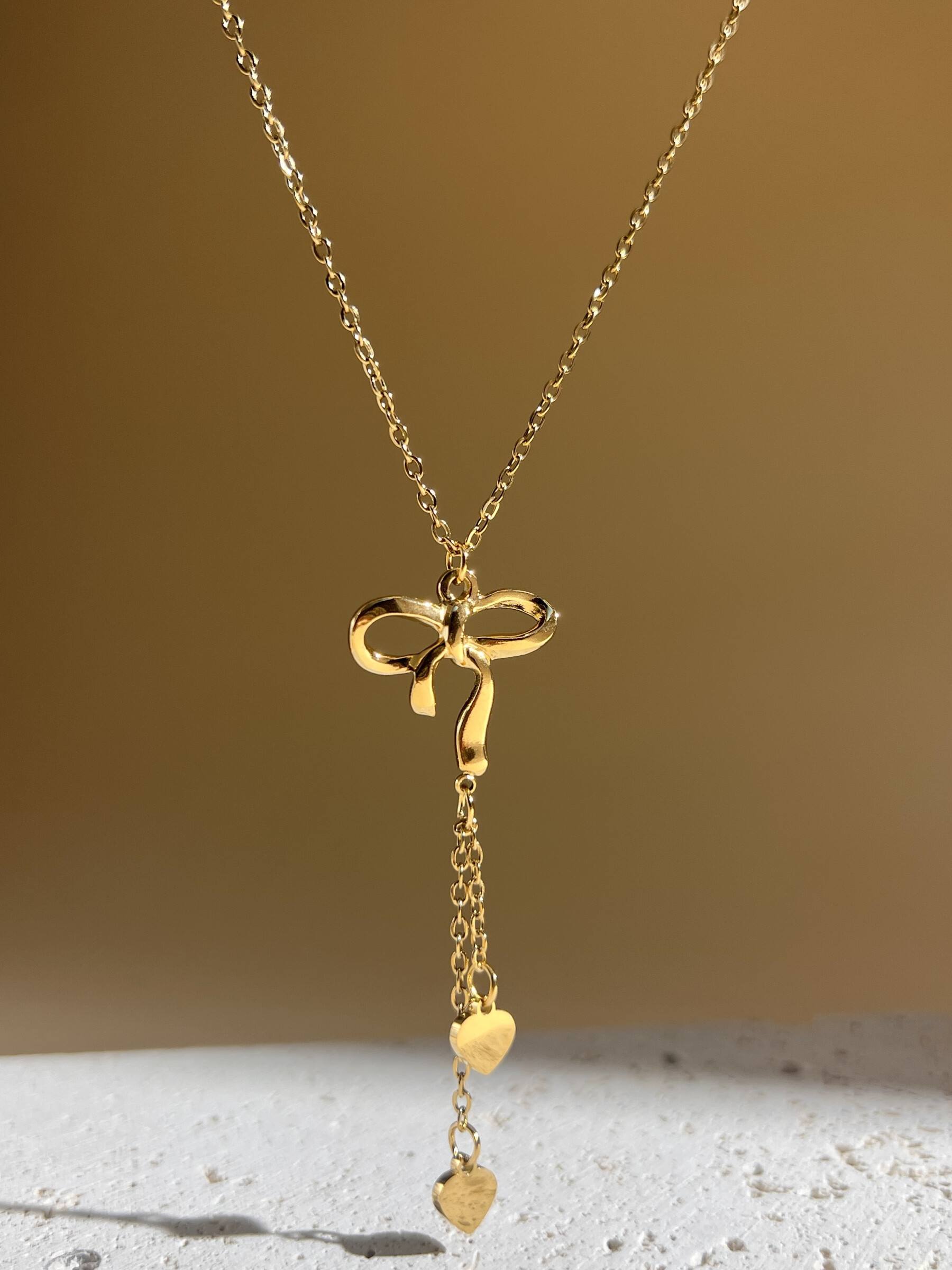 Grossista COSMOS - Collana in Acciaio Inossidabile – Nodo Elegante & Cuore Pendente