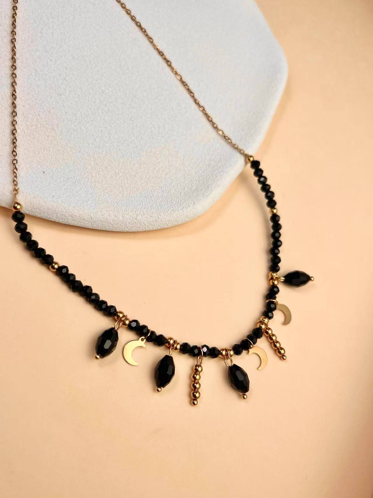 Wholesaler COSMOS - Double wrap necklace with black beads and a golden moon in stainless steel