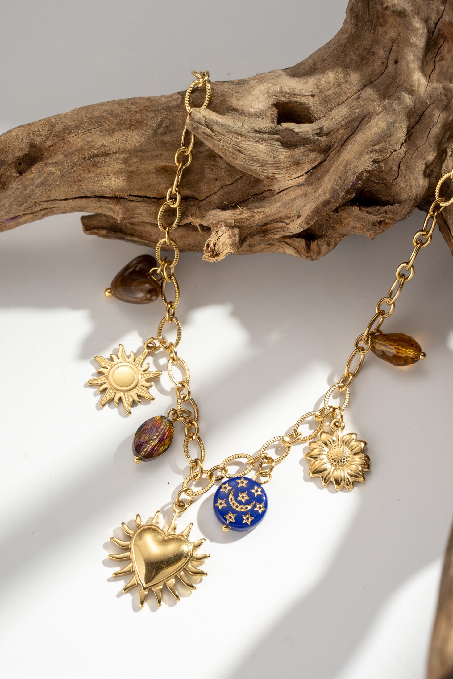 Grossiste COSMOS - Collier doré pendentif cœur solaire acier inoxydable protecteur