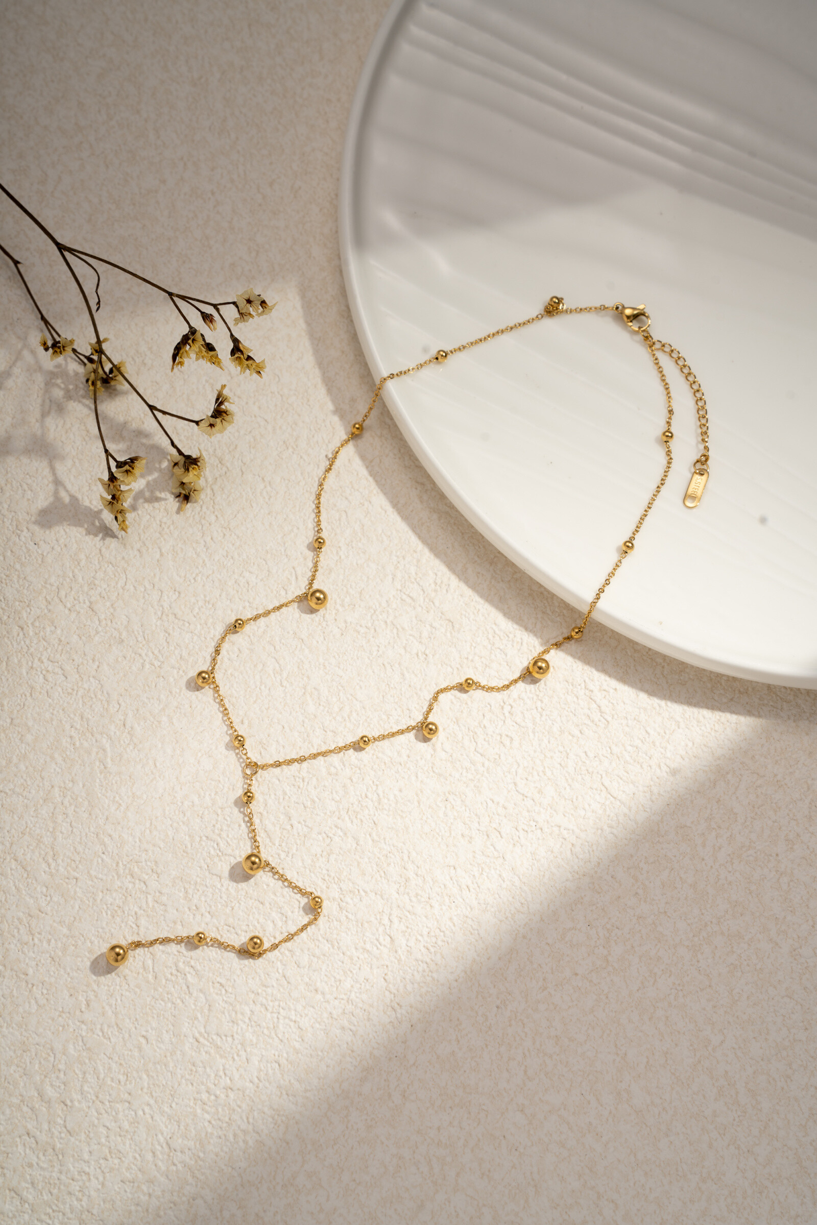 Wholesaler COSMOS - Y necklace with golden pearls