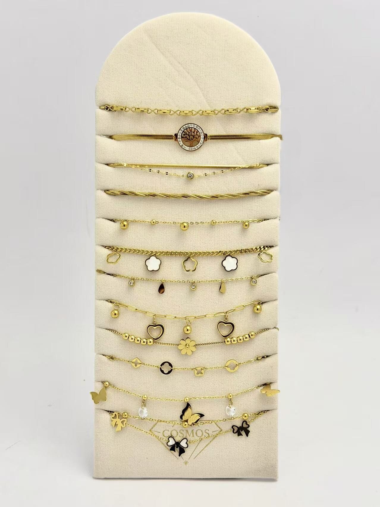 Grossiste COSMOS - Lot 12 Bracelets Dorés Motifs Variés TendanceAcier Inoxydable Sur présentoir
