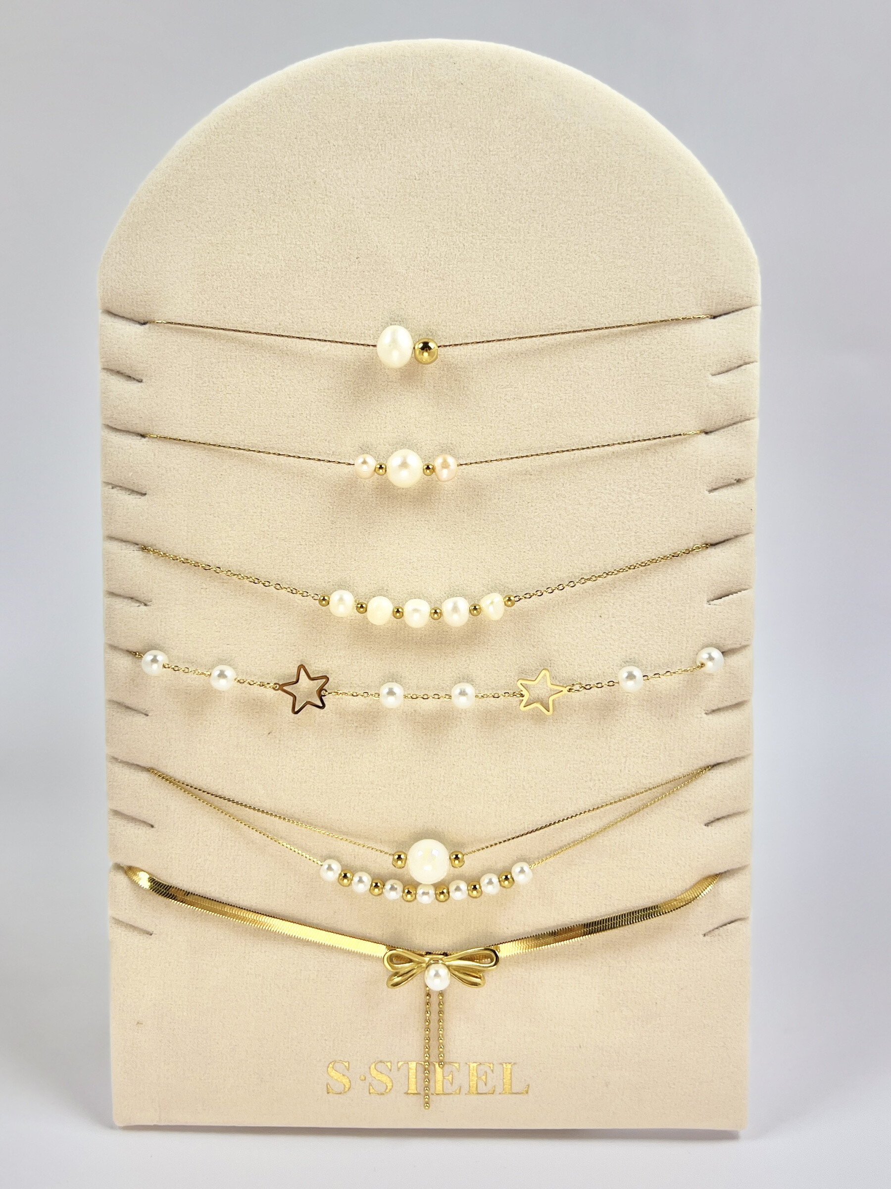 Grossiste COSMOS - Lot  6 Colliers Inoxydables en perles avec Présentoir Offert