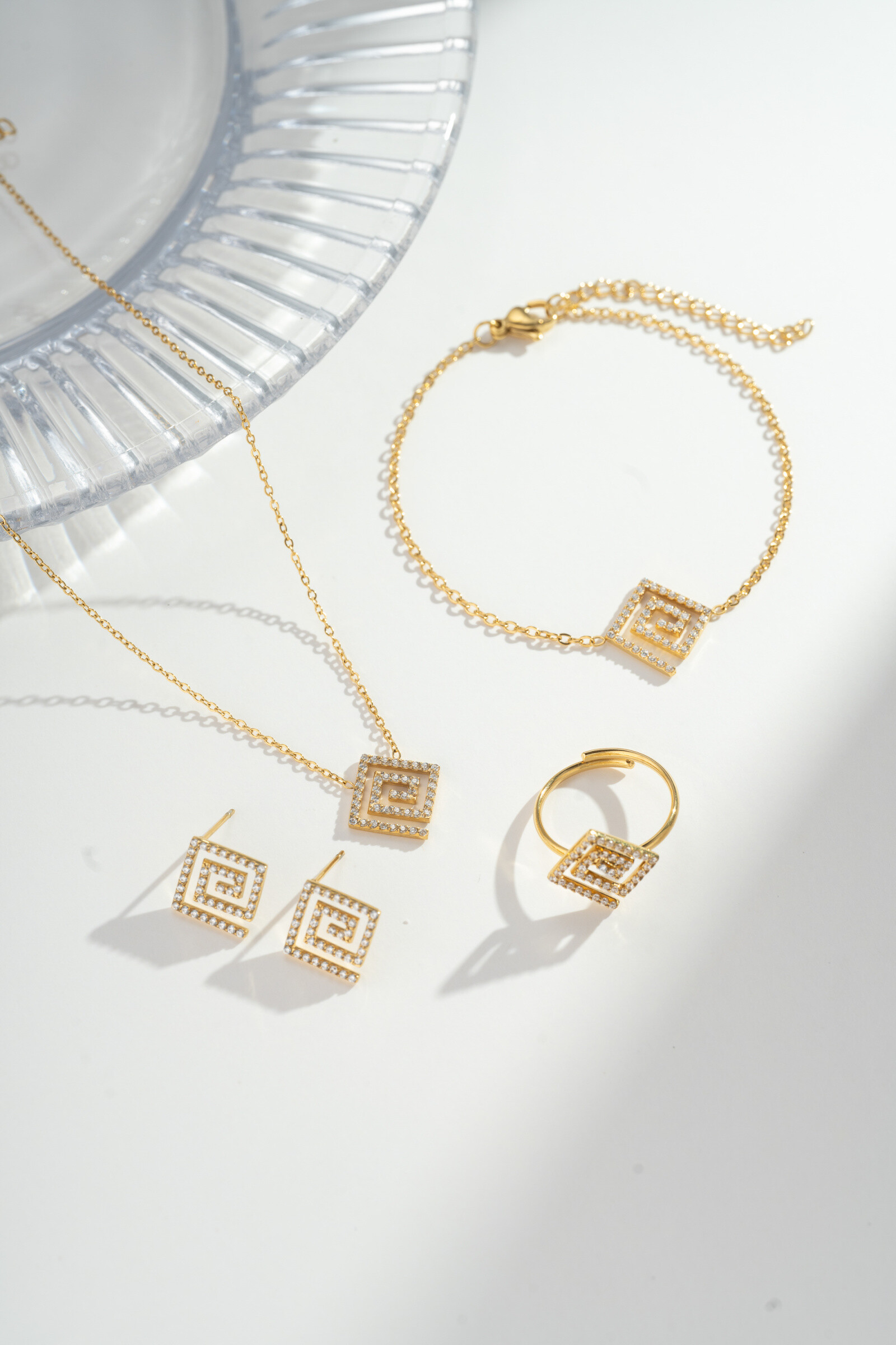 Wholesaler COSMOS - Rectangular Spiral Crystal 4-Piece Jewelry Set Necklace Bracelet Earrings Ring Steel