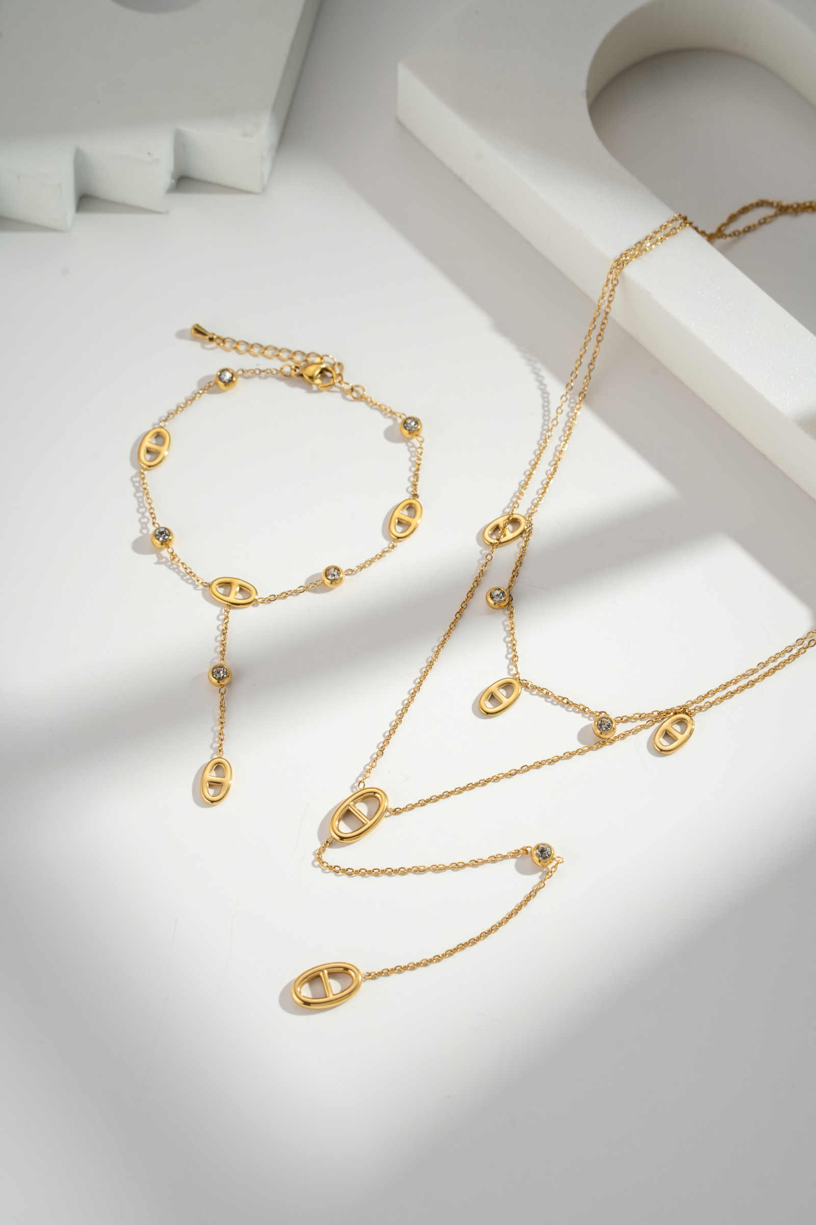 Grossiste COSMOS - Parure Dorée Femme Collier Bracelet Motif Ovale Acier Inoxydable