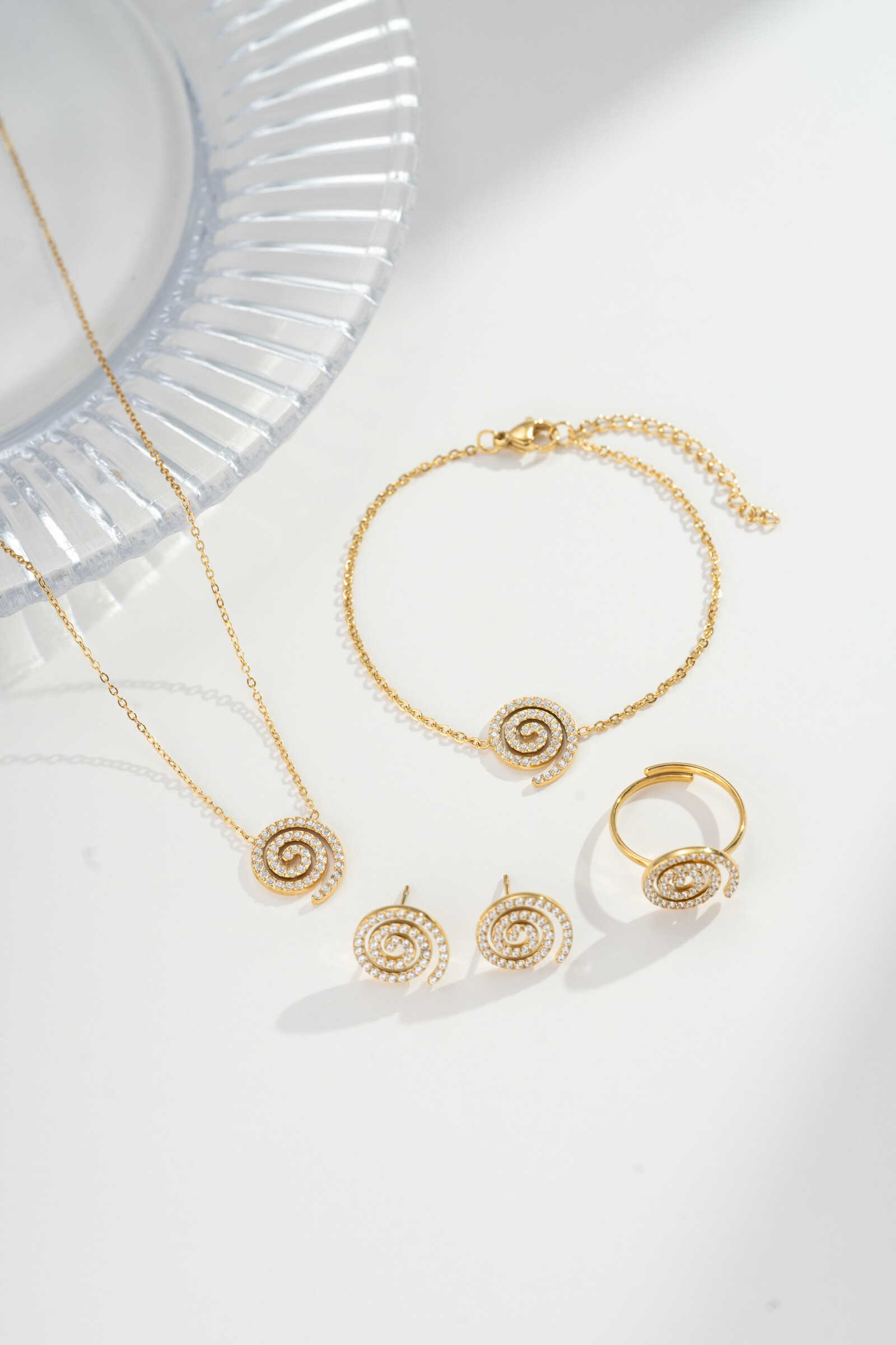 Wholesaler COSMOS - Golden spiral jewelry set 4 pieces - necklace, ring, bracelet, stainless steel earrings