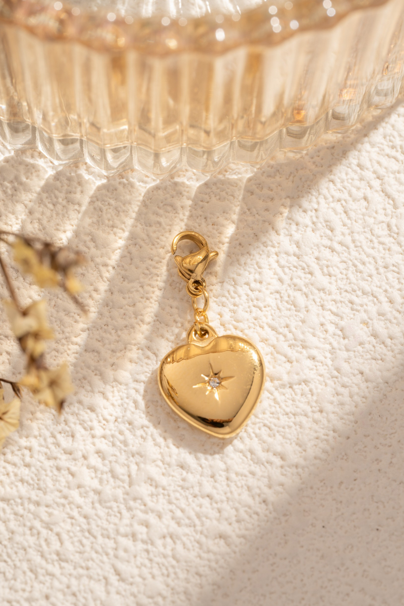 Wholesaler COSMOS - Heart pendant engraved with star crystal in gold and silver for chic, elegant, trendy women