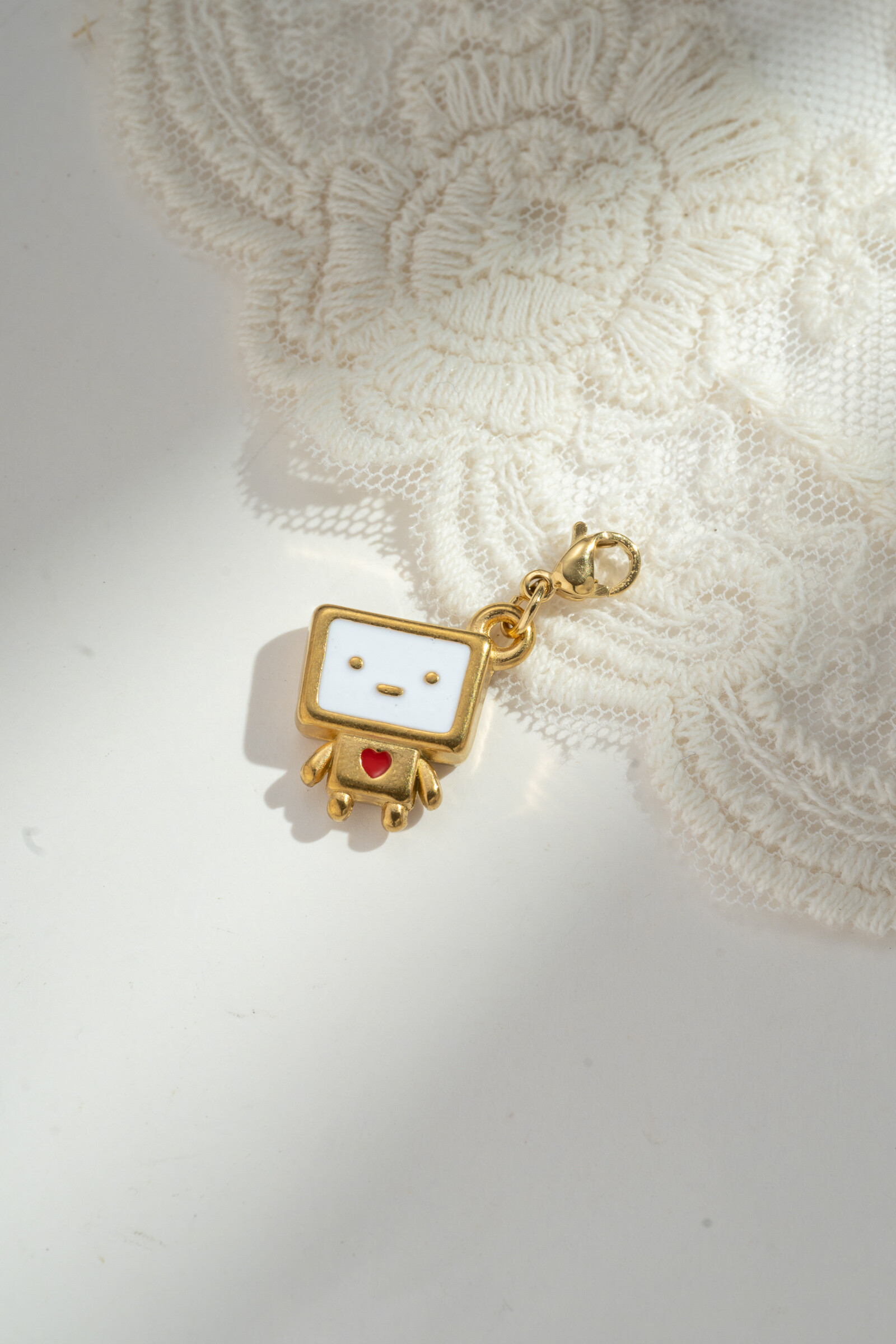 Grossiste COSMOS - Pendentif petit bonhomme fun en acier inoxydable