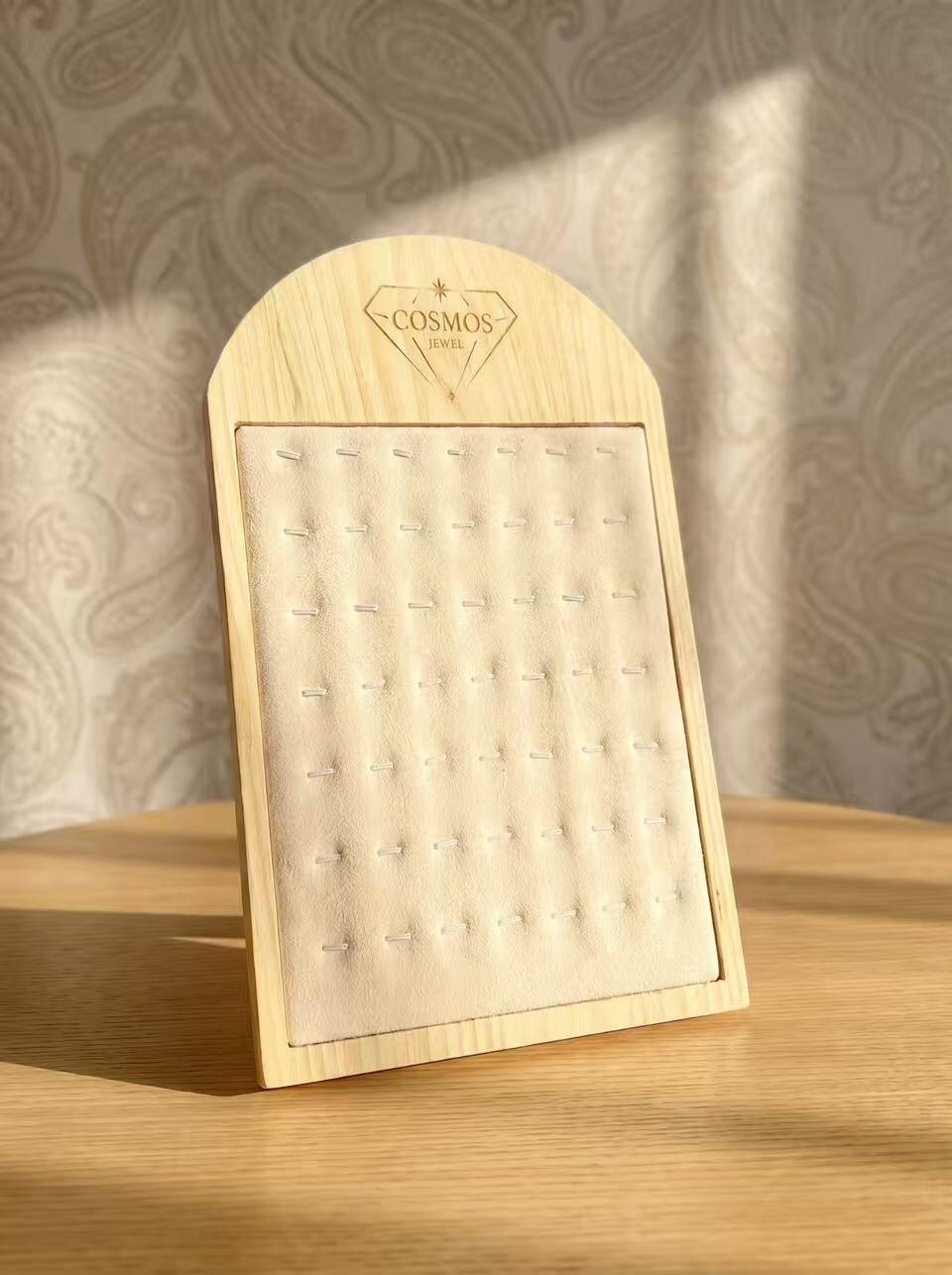 Grossiste COSMOS - Présentoir bois chic 49 charms format 29x20.5cm élégant support arrière