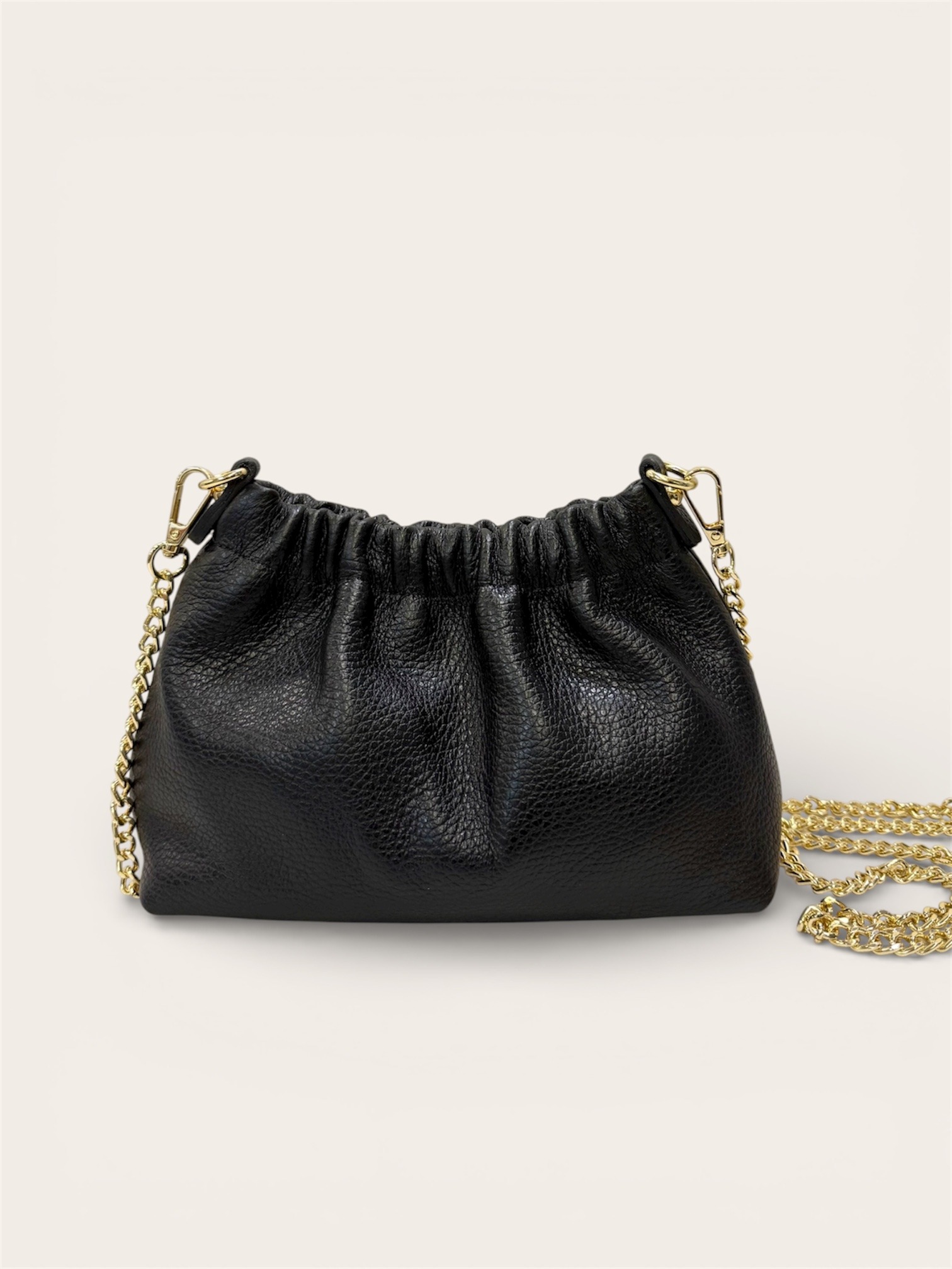 Grossiste CUOIO & CHIC - Pochette Élégante en Cuir Martelé